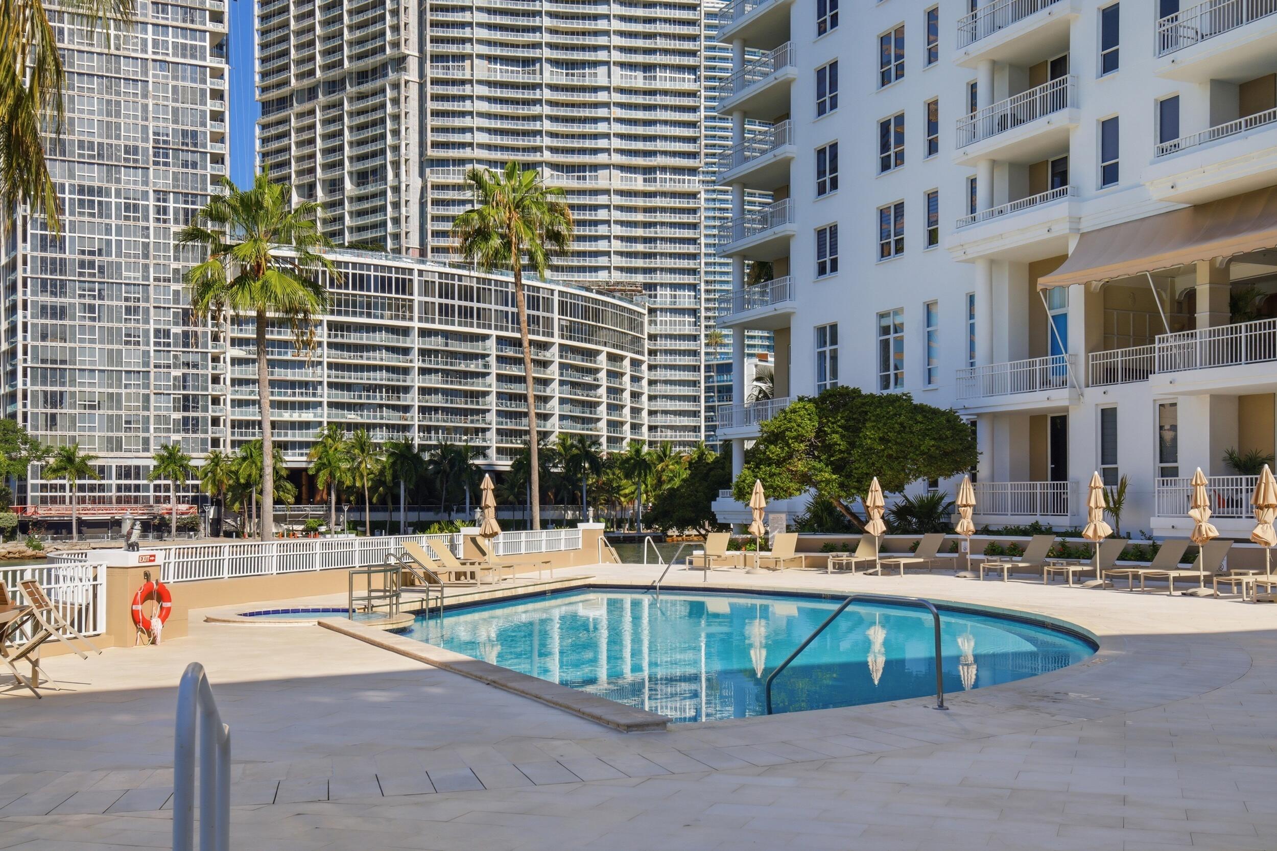 701 Brickell Key Boulevard, Unit 610 Miami, FL 33131 - Photo 3 of 40 a view of a swimming pool with a patio