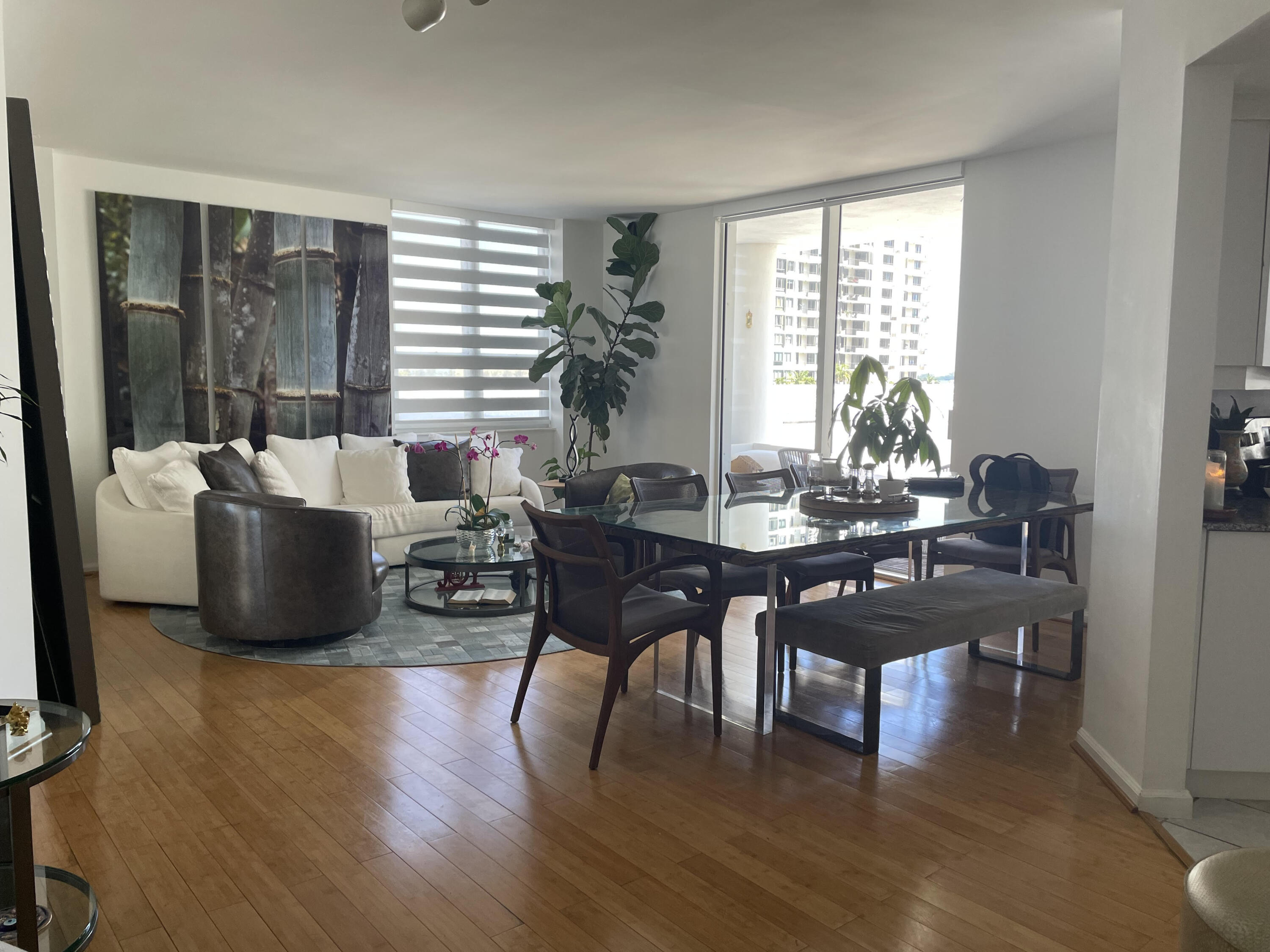 701 Brickell Key Boulevard, Unit 610 Miami, FL 33131 - Photo 40 of 40 a living room with furniture a wooden floor and a window