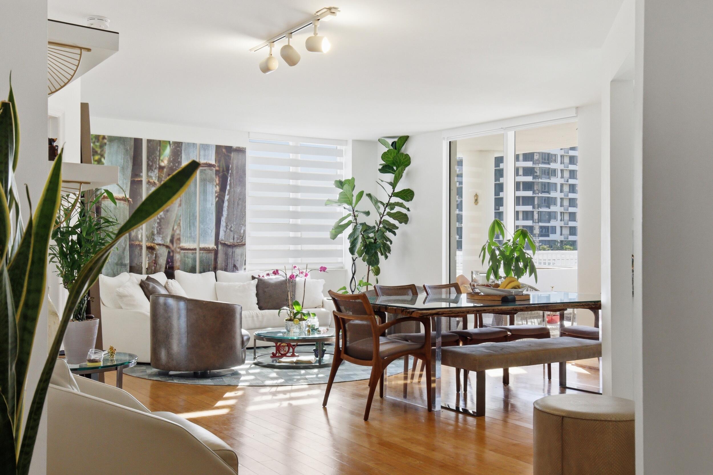 701 Brickell Key Boulevard, Unit 610 Miami, FL 33131 - Photo 6 of 40 a view of a dining room with furniture window and wooden floor