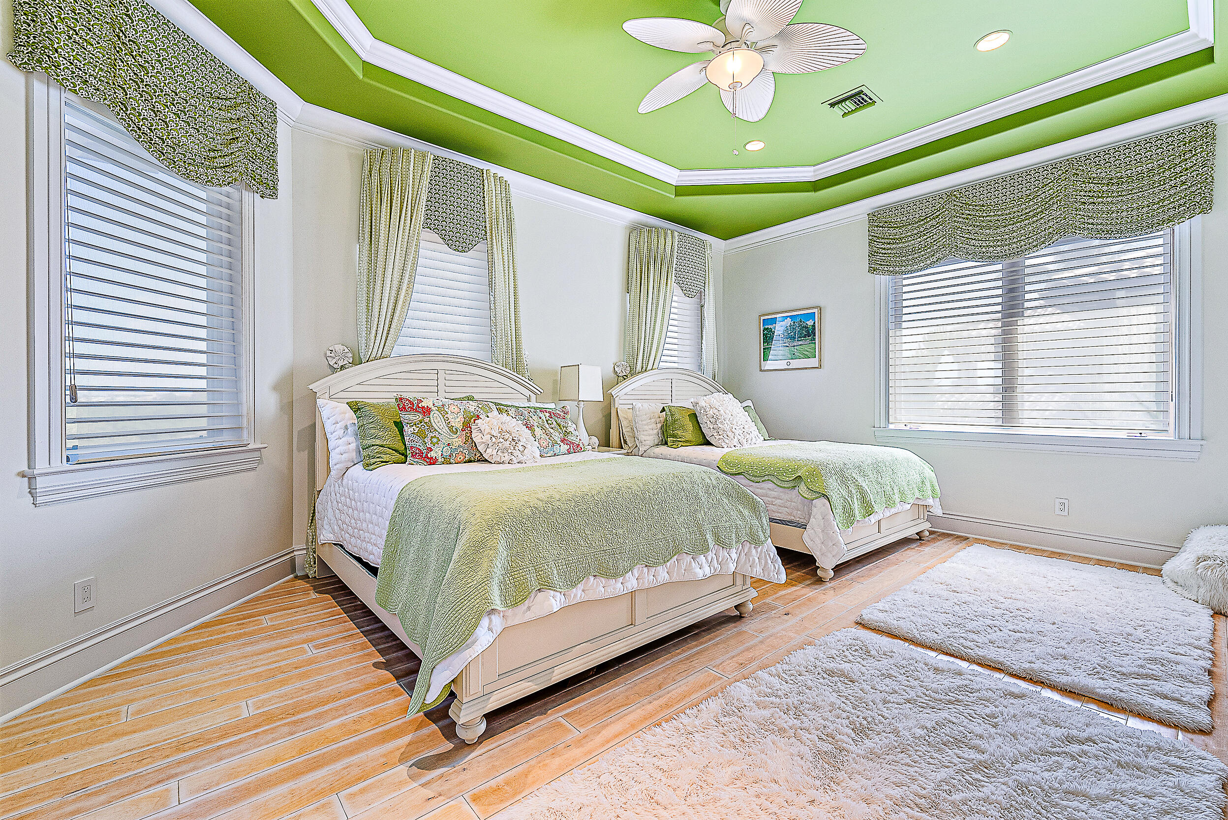 337 Old Jupiter Beach Road Jupiter, FL 33477 - Photo 29 of 38 a bedroom with two beds and a chandelier