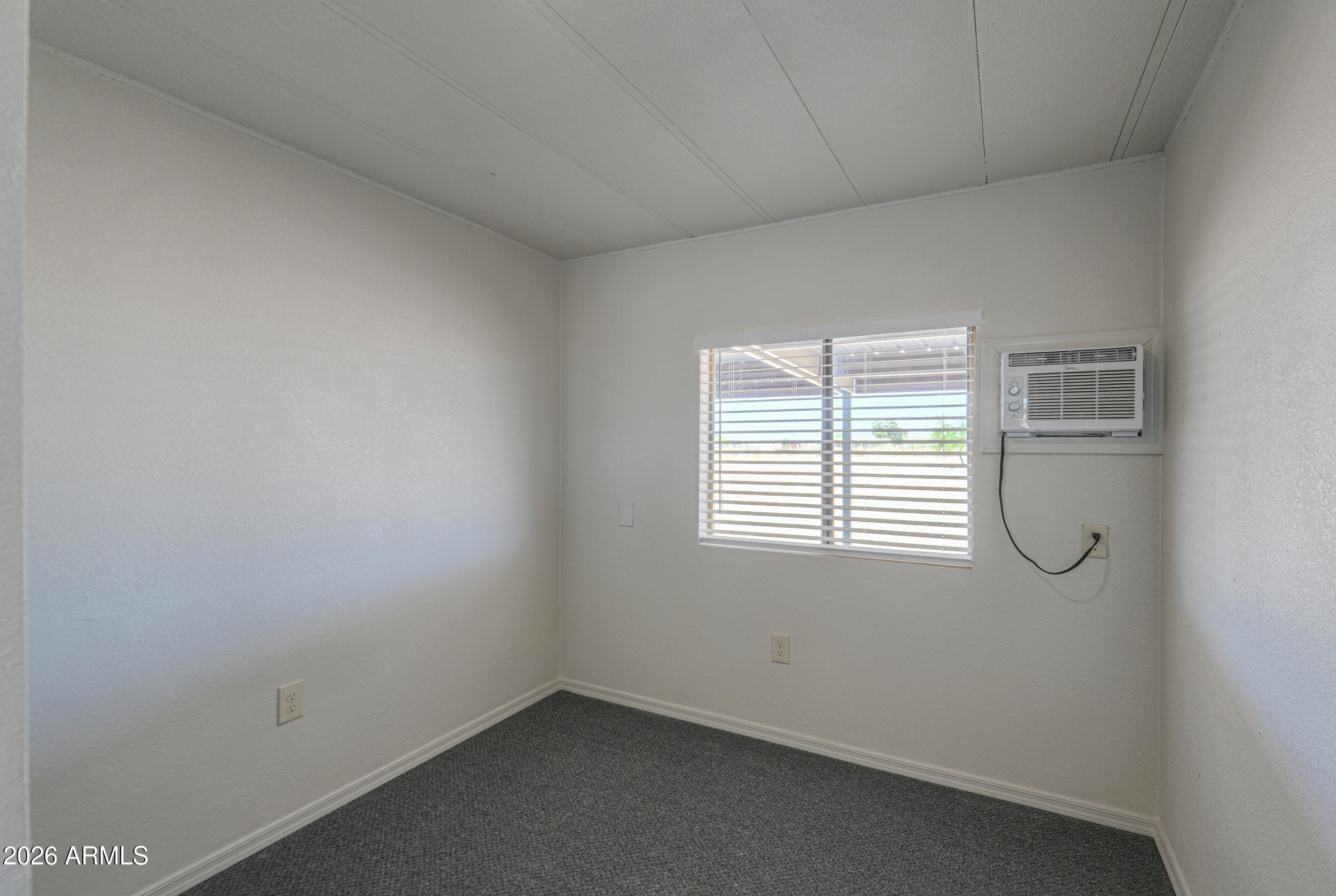 33776 West Siesta Road Stanfield, AZ 85172 - Photo 43 of 54 an empty room with a window