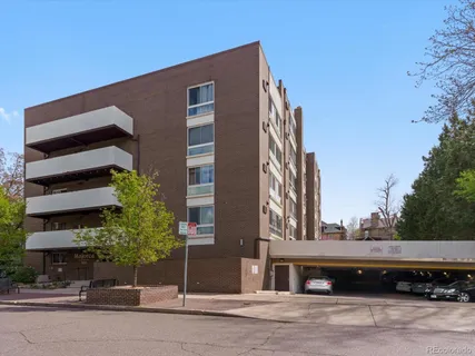 a front view of a building with street view