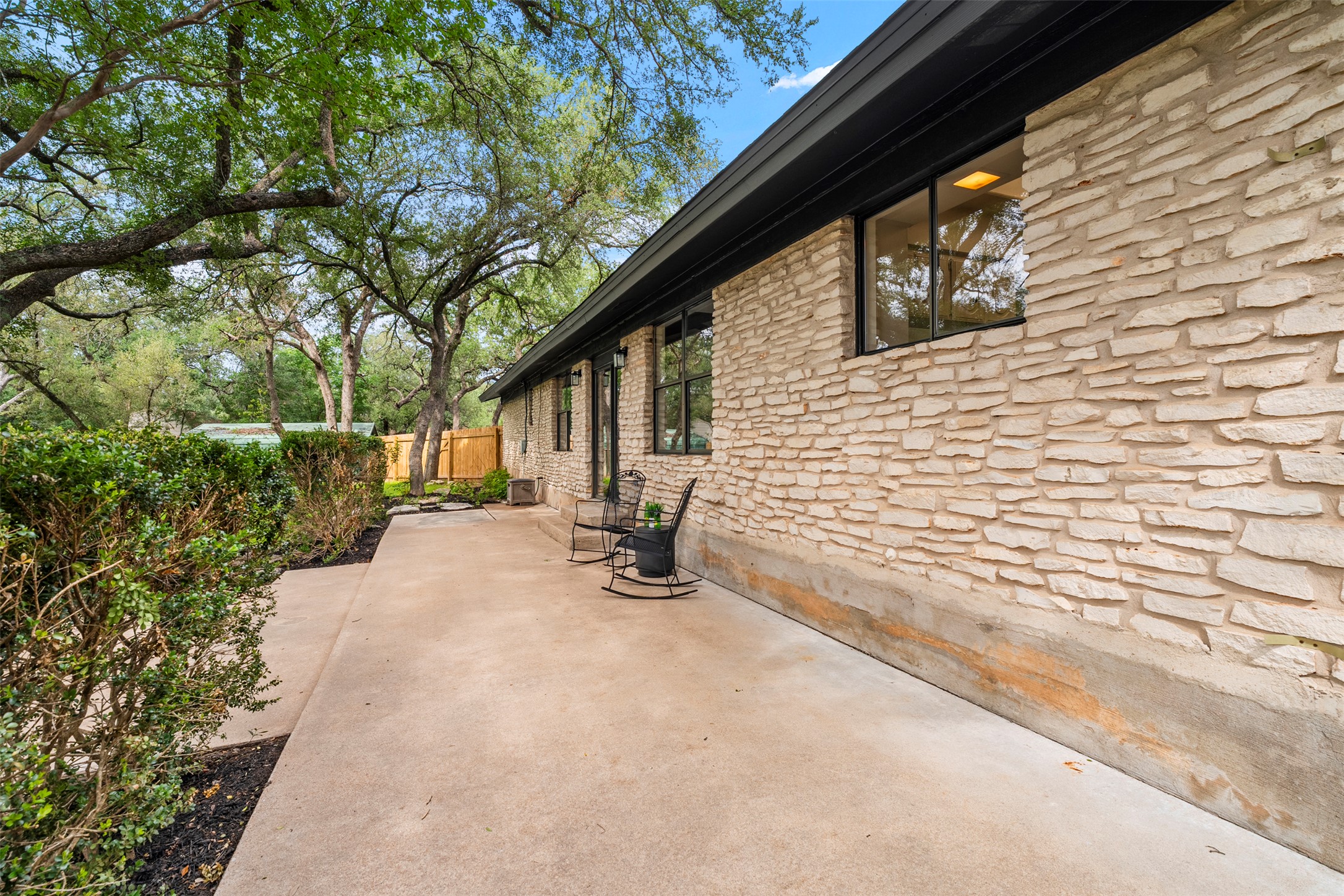 303 West Sequoia Spur Georgetown, TX 78628 - Photo 23 of 34 a view of backyard with patio