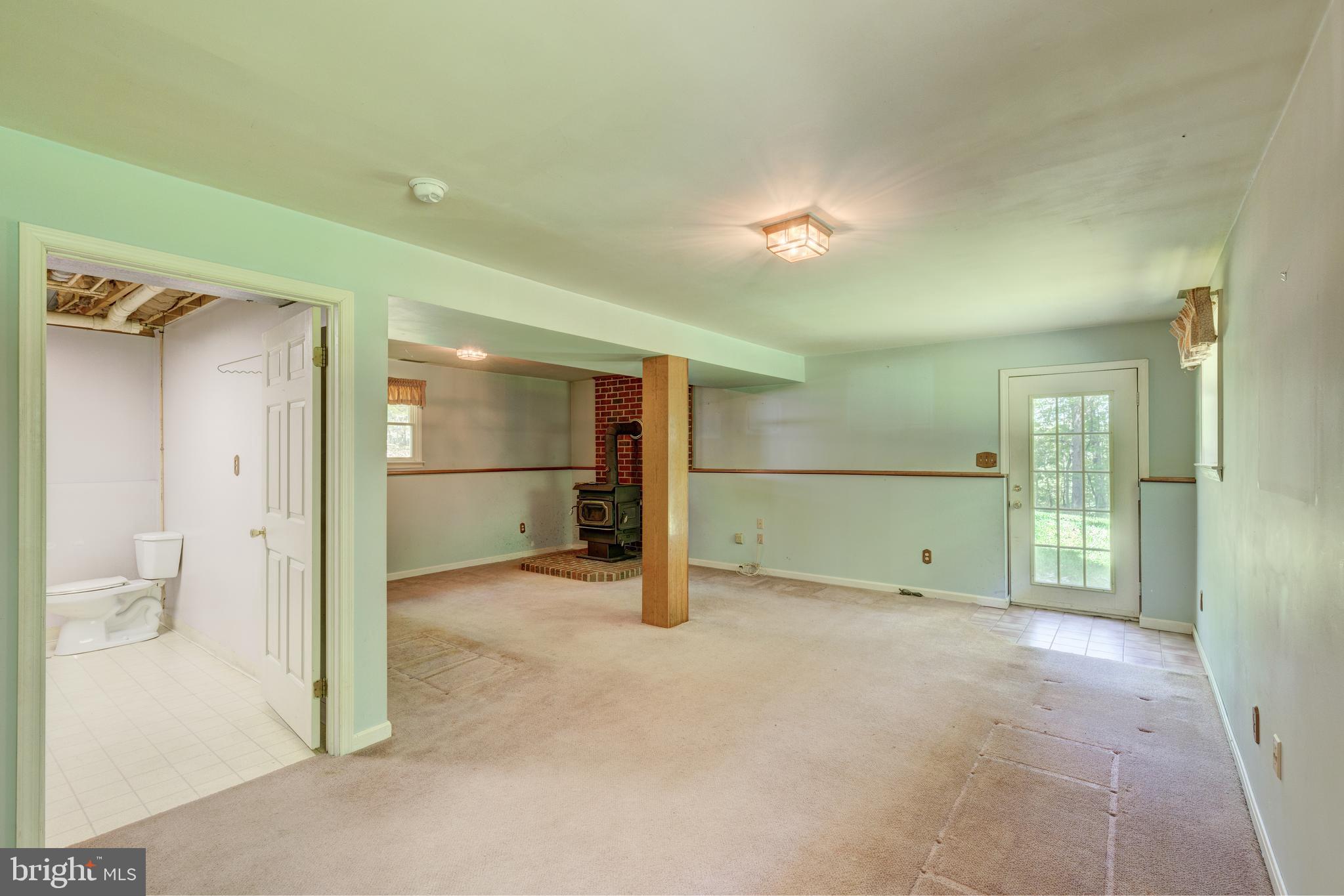 2409 Stone Road Westminster, MD 21158 - Photo 16 of 36 Lower Level #1 is finished w/walk-out to side yard