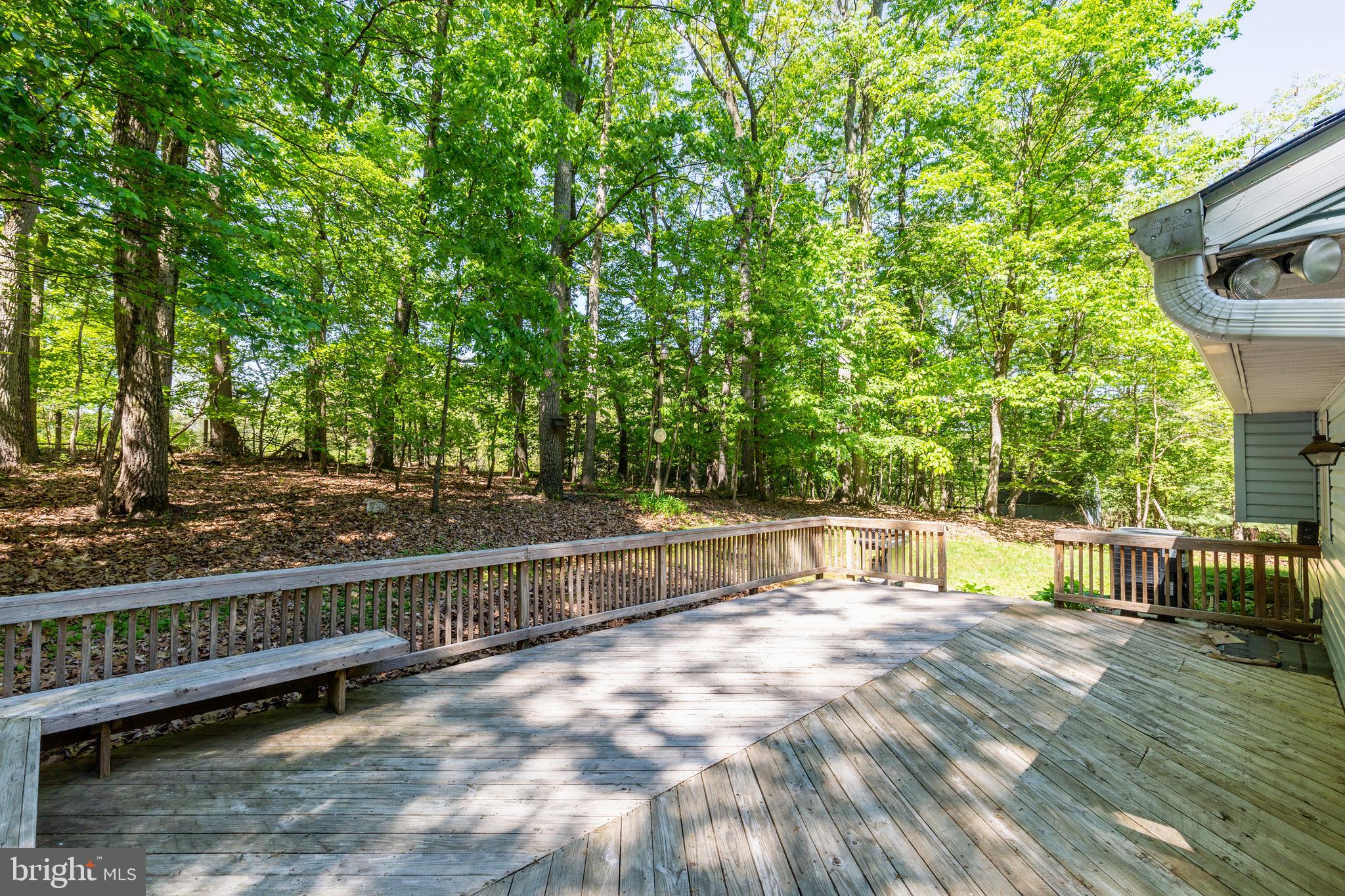 2409 Stone Road Westminster, MD 21158 - Photo 23 of 36 Deck with built-in benches