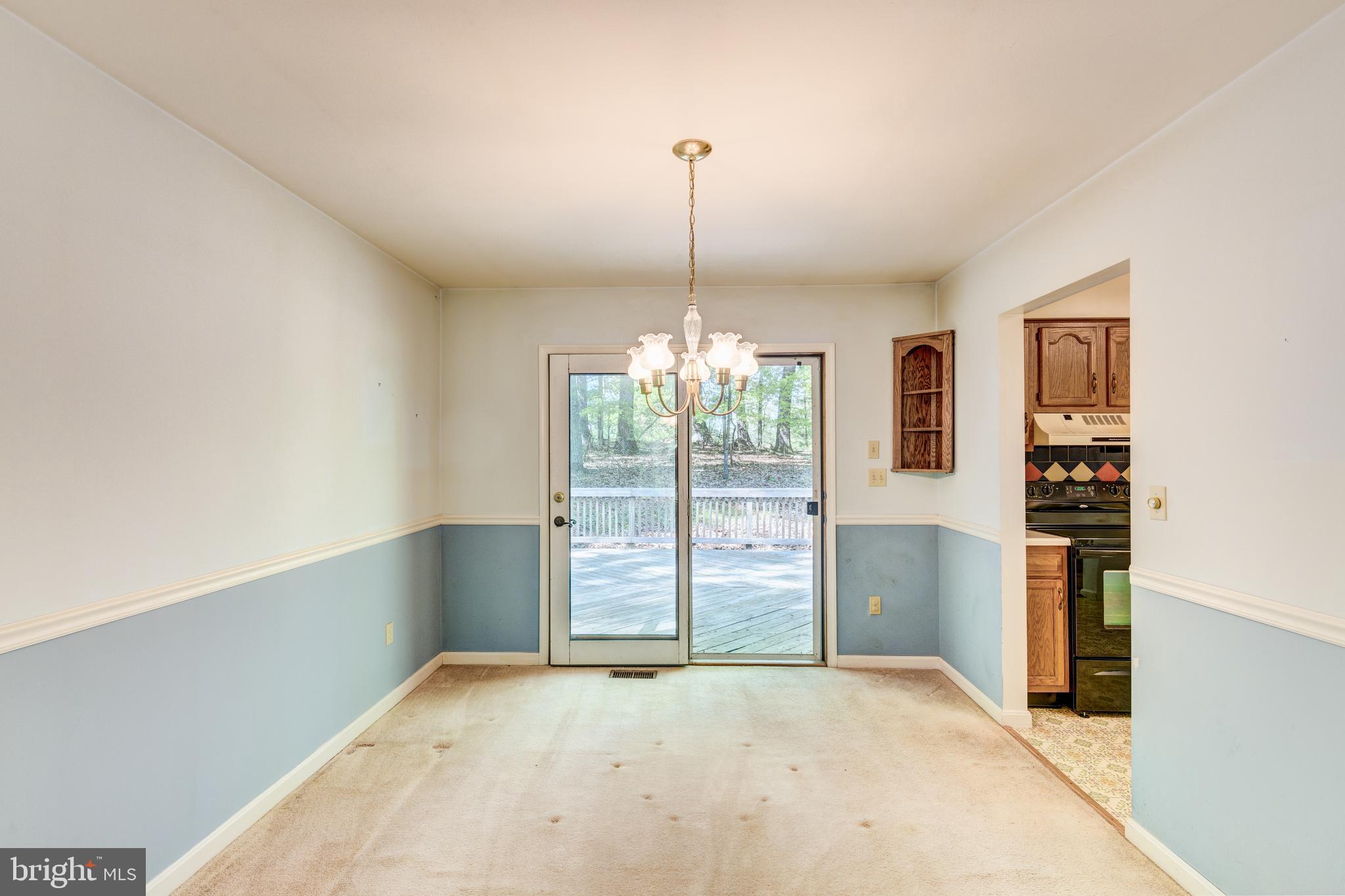 2409 Stone Road Westminster, MD 21158 - Photo 6 of 36 Dining room with Pella doors to deck