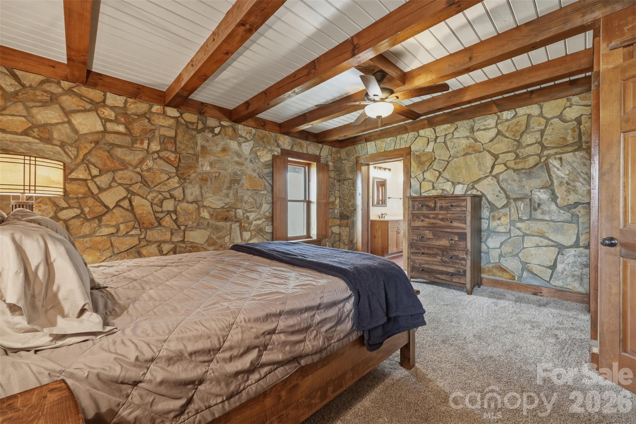2255 Mt Olive Church Road Newton, NC 28658 - Photo 14 of 43 a bed sitting in a spacious bedroom next to a window