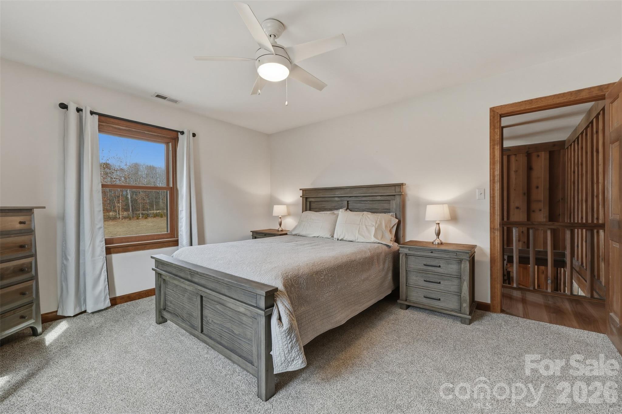 2255 Mt Olive Church Road Newton, NC 28658 - Photo 19 of 43 a bedroom with a bed and a cabinets