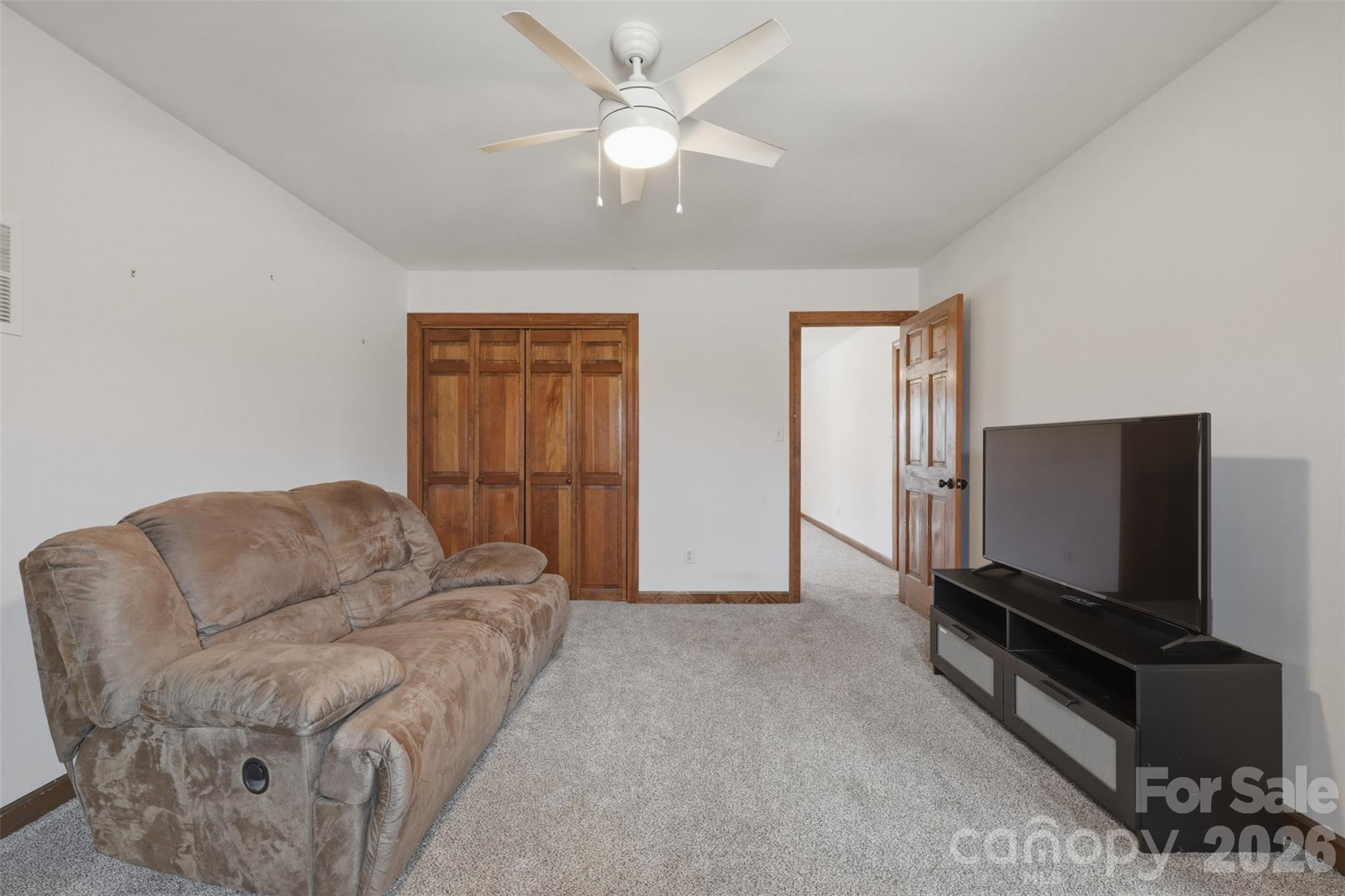 2255 Mt Olive Church Road Newton, NC 28658 - Photo 24 of 43 a living room with furniture and a flat screen tv