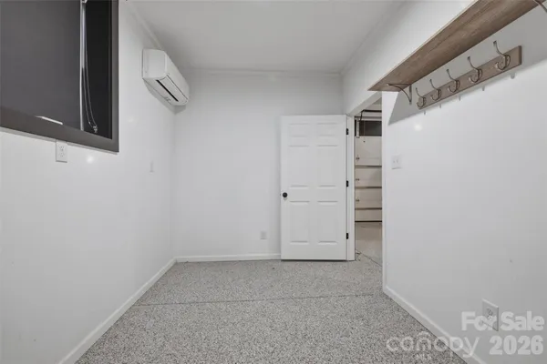 a room with storage and utility room