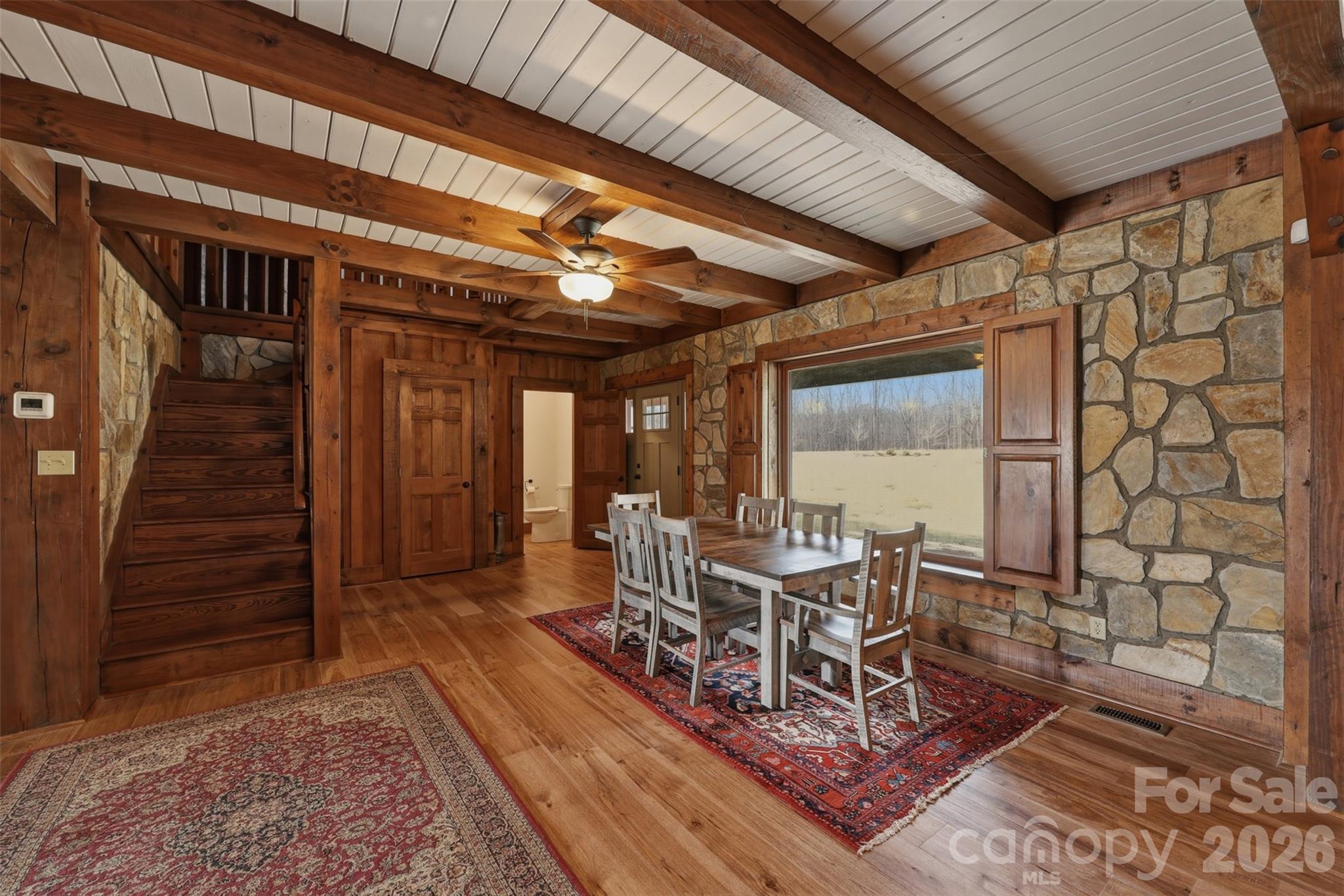 2255 Mt Olive Church Road Newton, NC 28658 - Photo 8 of 43 a view of a dining room with furniture window and wooden floor