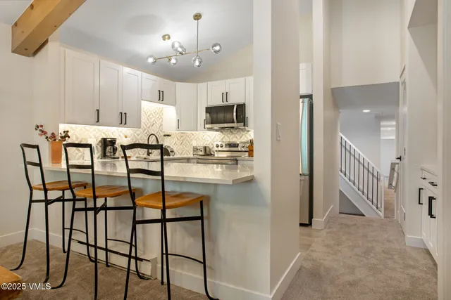 a view of a dining room with furniture