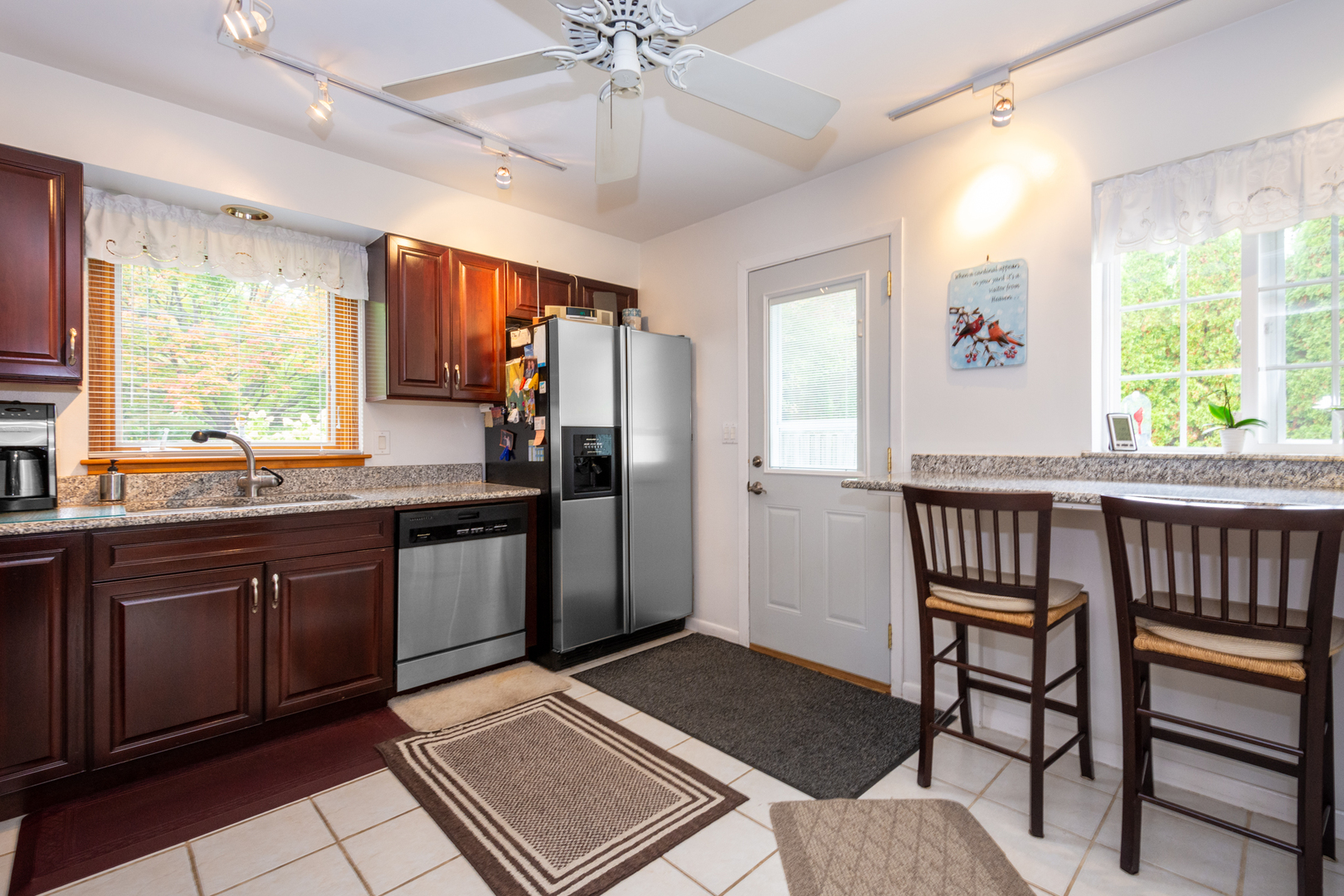 1420 Lee Road Northbrook, IL 60062 - Photo 11 of 36 a kitchen with a sink appliances and a window