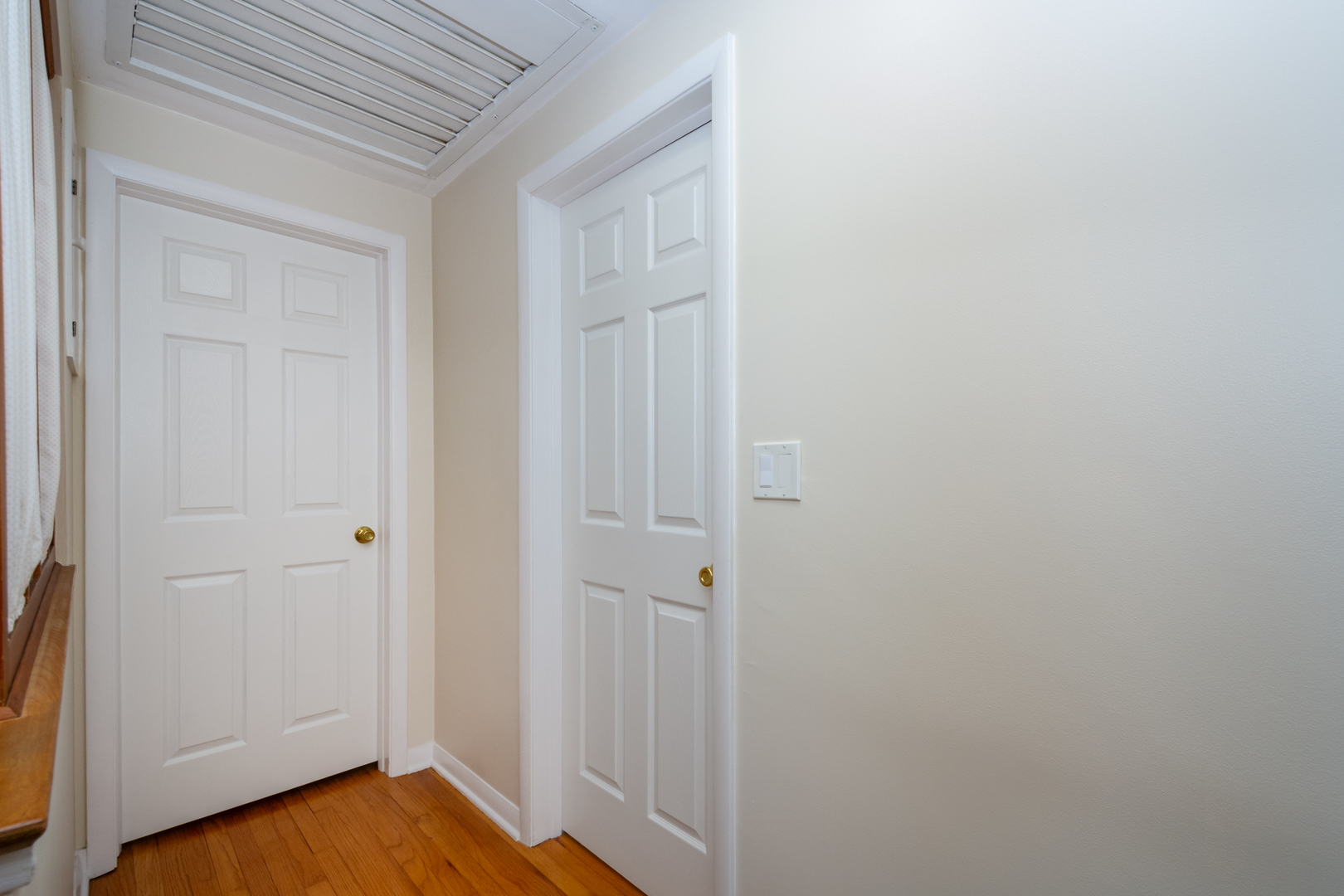 1420 Lee Road Northbrook, IL 60062 - Photo 14 of 36 a view of a hallway with wooden floor