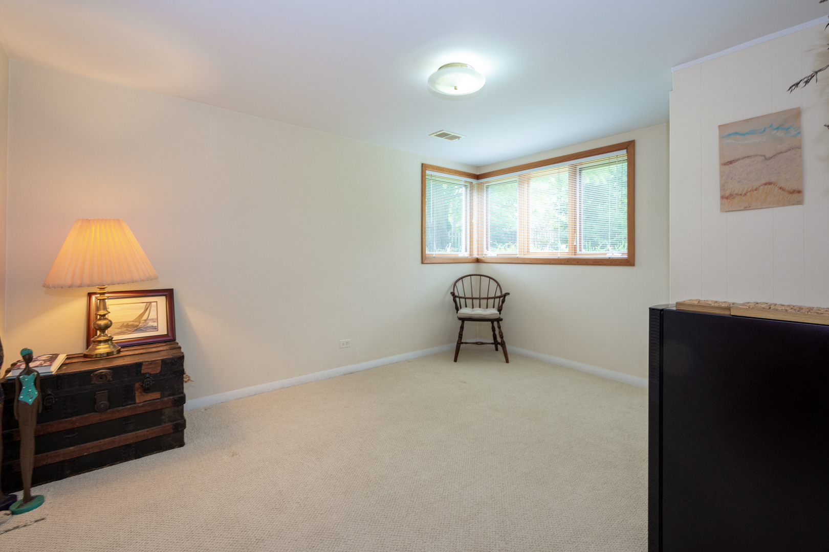 1420 Lee Road Northbrook, IL 60062 - Photo 21 of 36 wooden floor in an empty room with a window