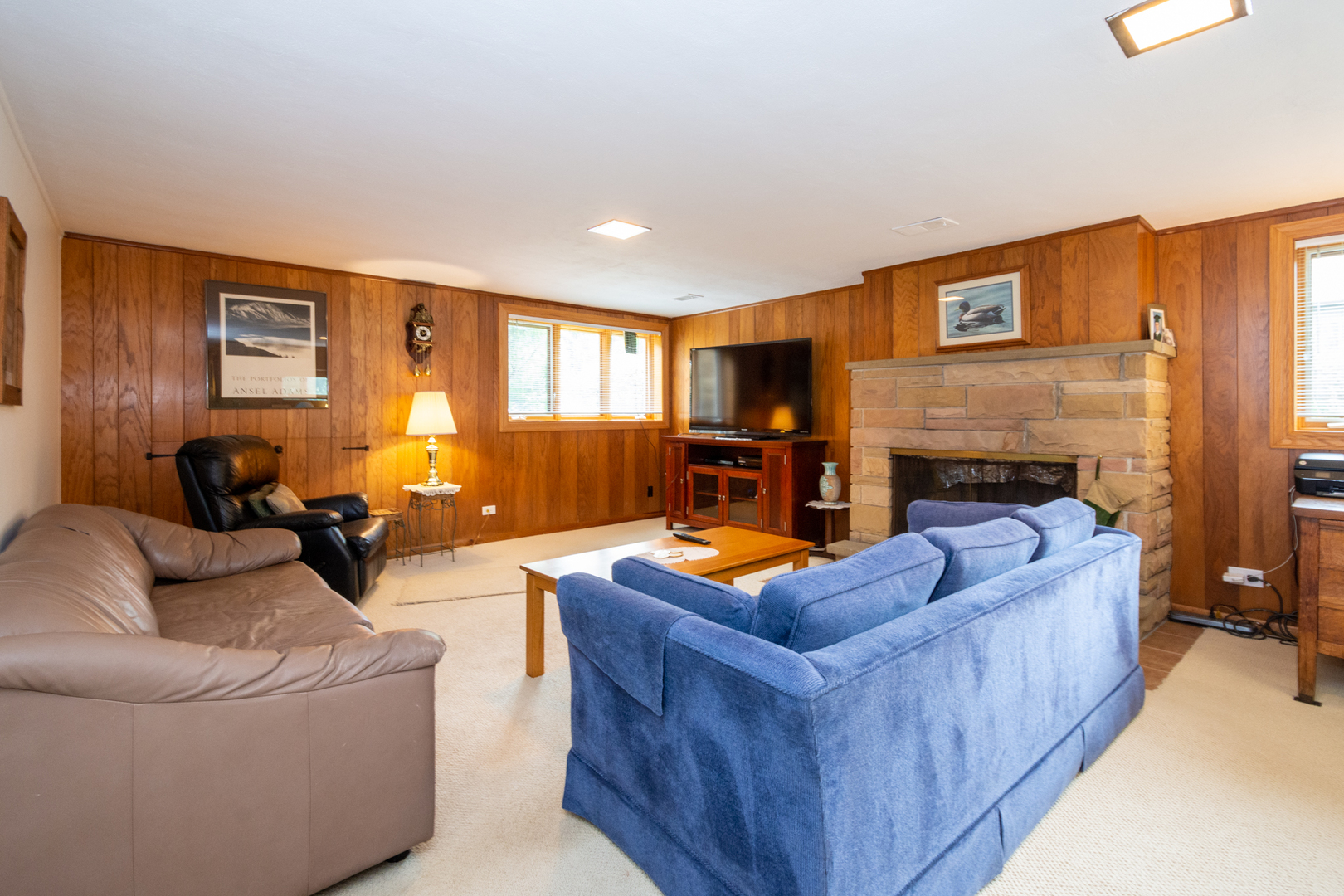 1420 Lee Road Northbrook, IL 60062 - Photo 23 of 36 a living room with furniture and a fireplace