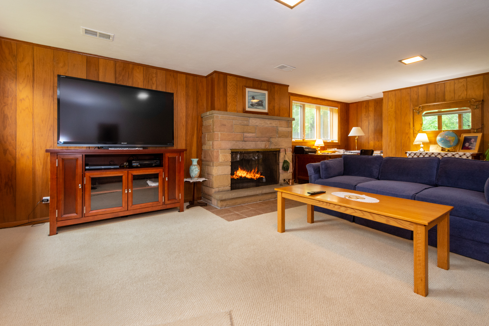 1420 Lee Road Northbrook, IL 60062 - Photo 24 of 36 a living room with furniture and a flat screen tv