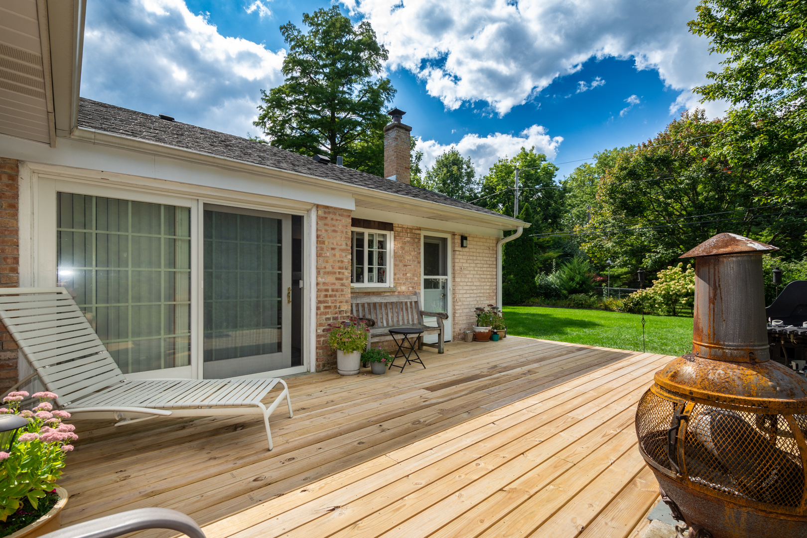 1420 Lee Road Northbrook, IL 60062 - Photo 28 of 36 a view of a backyard with sitting area and garden