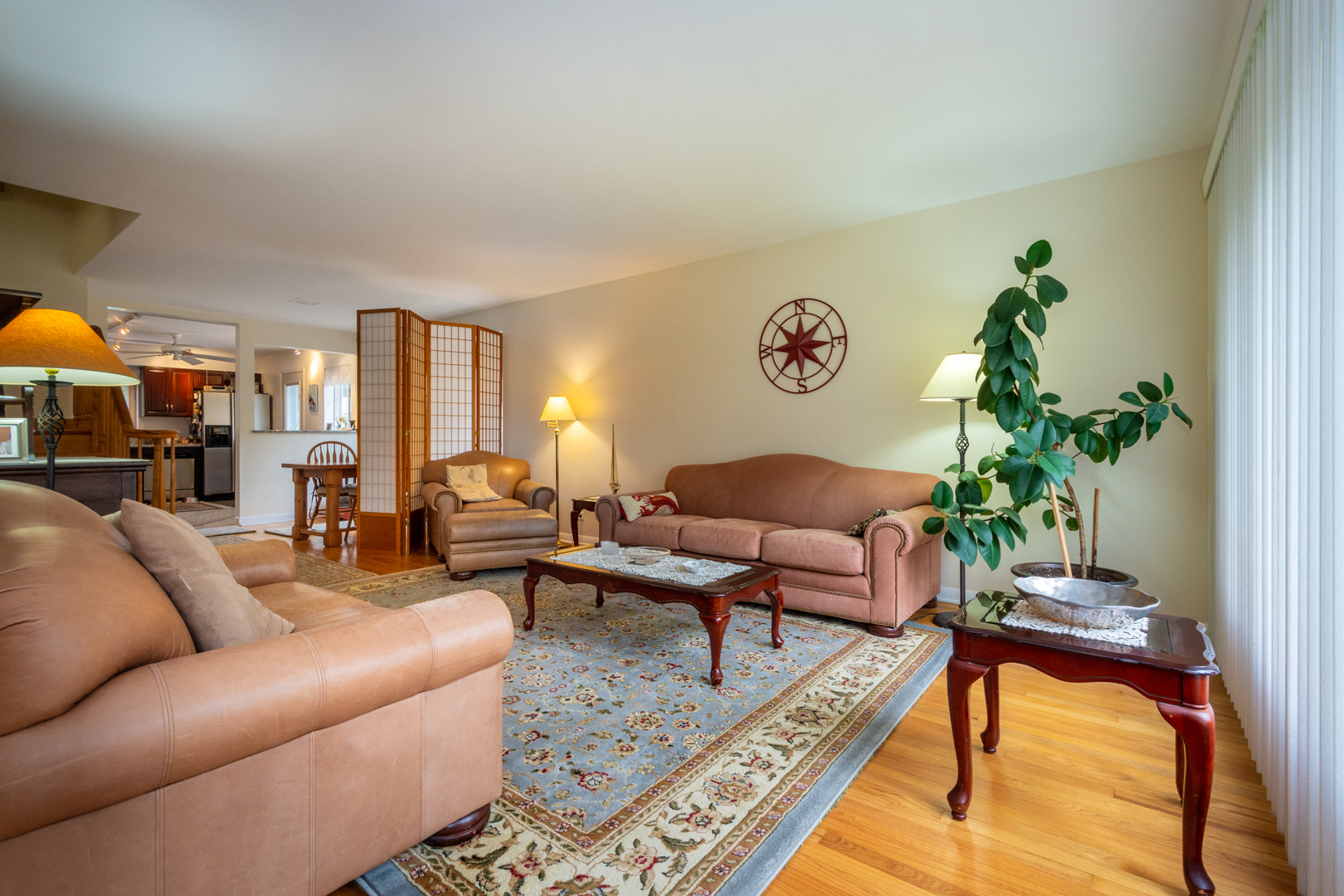 1420 Lee Road Northbrook, IL 60062 - Photo 4 of 36 a living room with furniture or couch and a potted plant