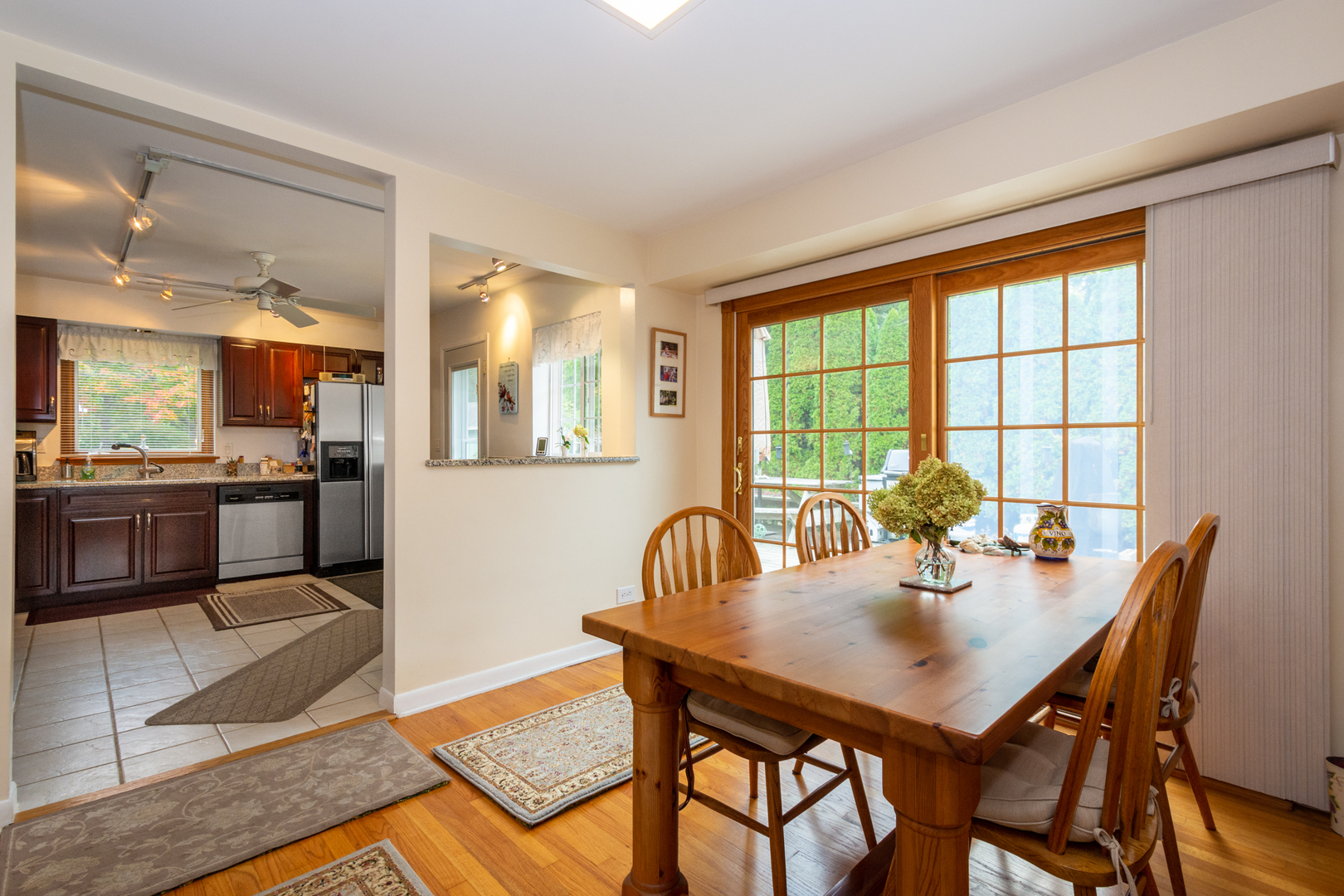 1420 Lee Road Northbrook, IL 60062 - Photo 7 of 36 a view of a dining room with furniture and wooden floor