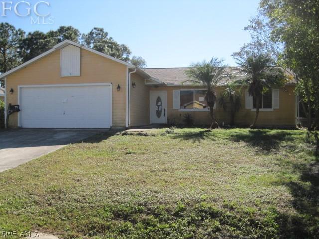a front view of house with yard