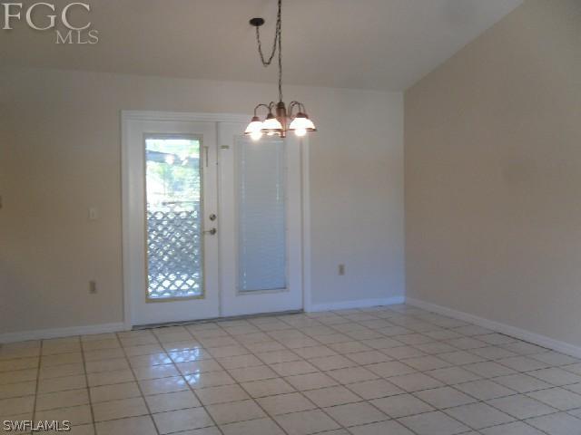 9016 Morris Road Fort Myers, FL 33967 - Photo 4 of 12 an empty room with windows