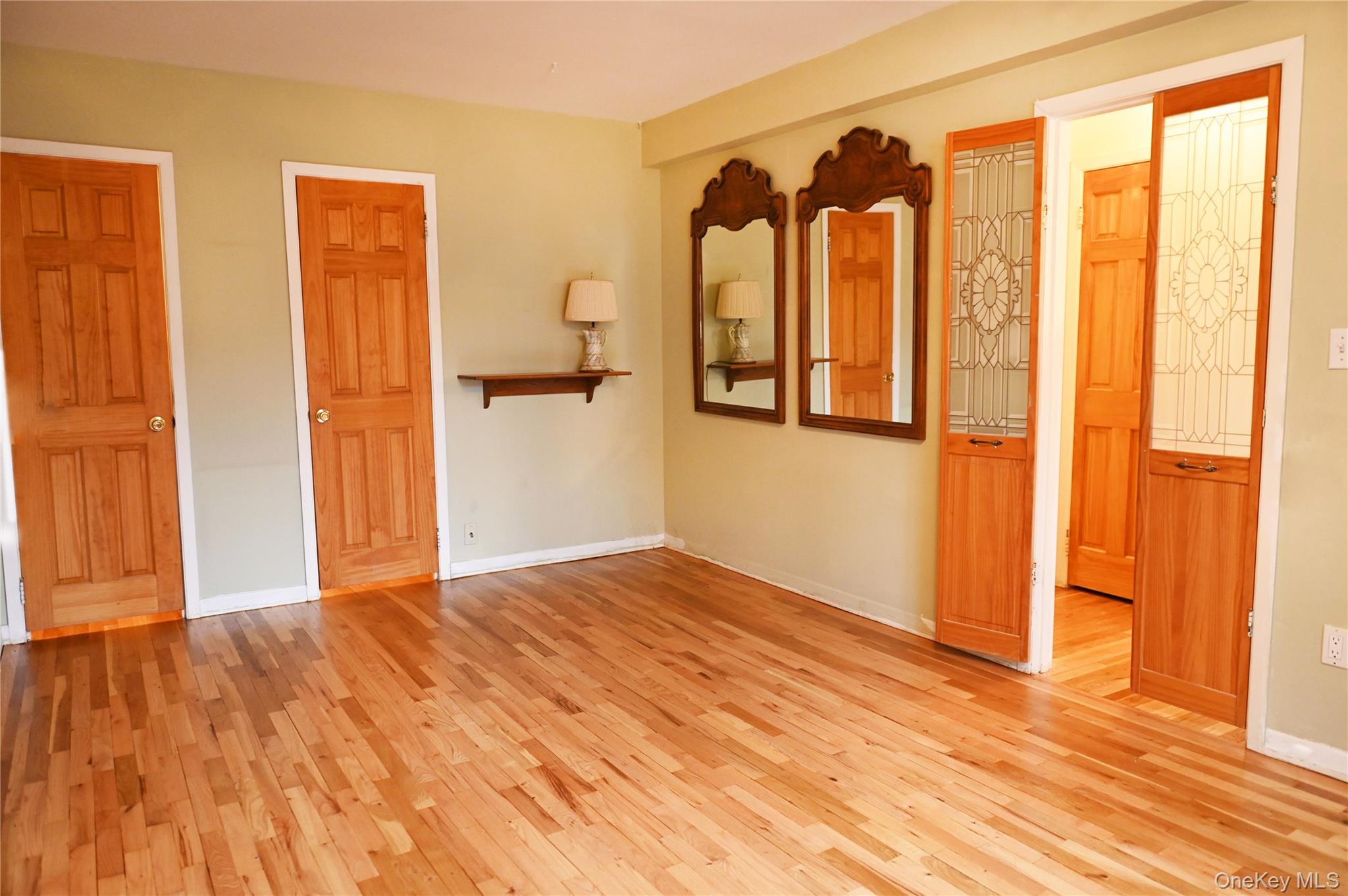 2 Fowler Avenue, Unit 228 Lynbrook, NY 11563 - Photo 14 of 21 Primary Bedroom with newly refinished floors