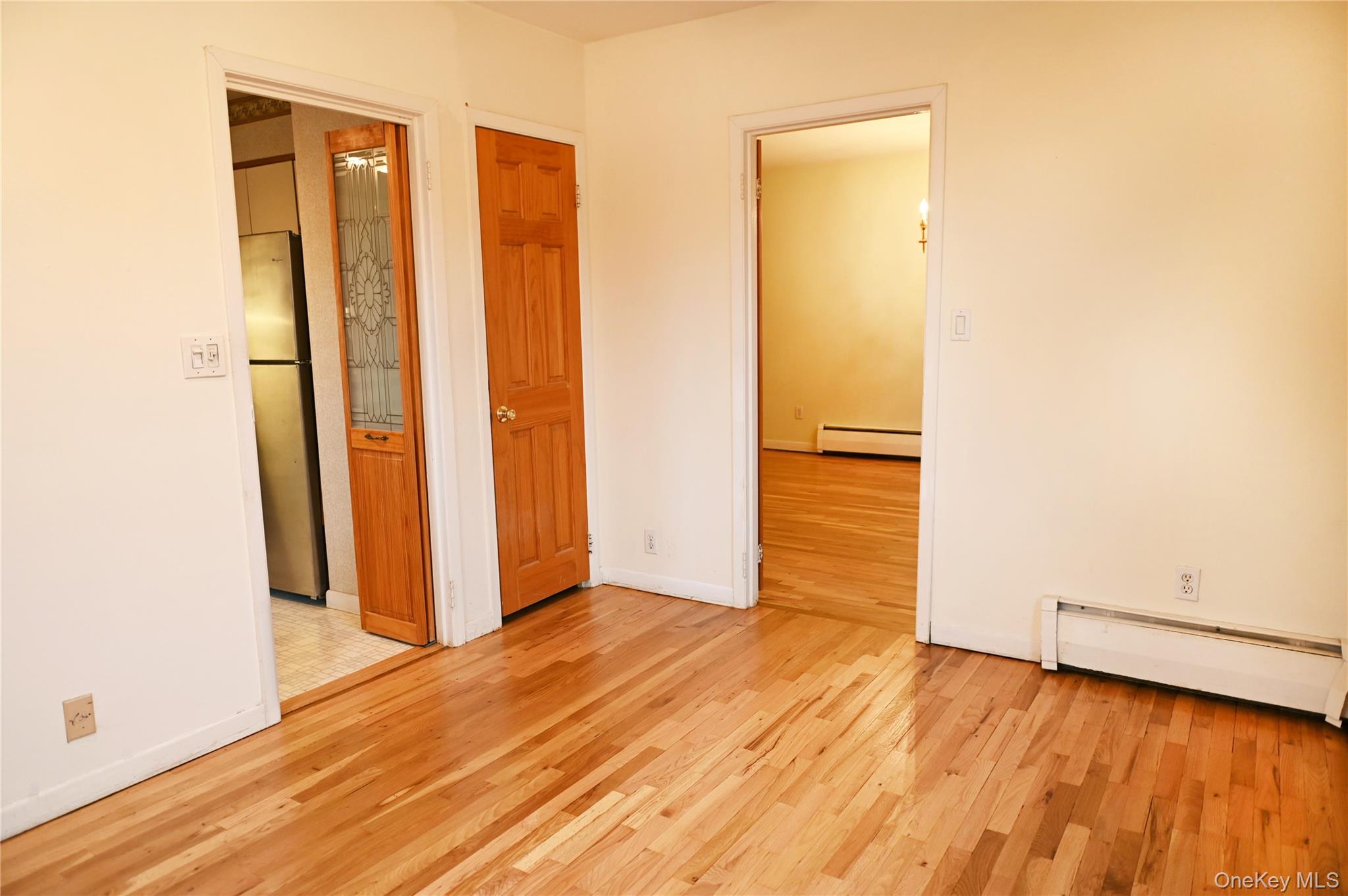 2 Fowler Avenue, Unit 228 Lynbrook, NY 11563 - Photo 17 of 21 2nd Bedroom Office/ Formal Dining/ Den with newly refinished floors