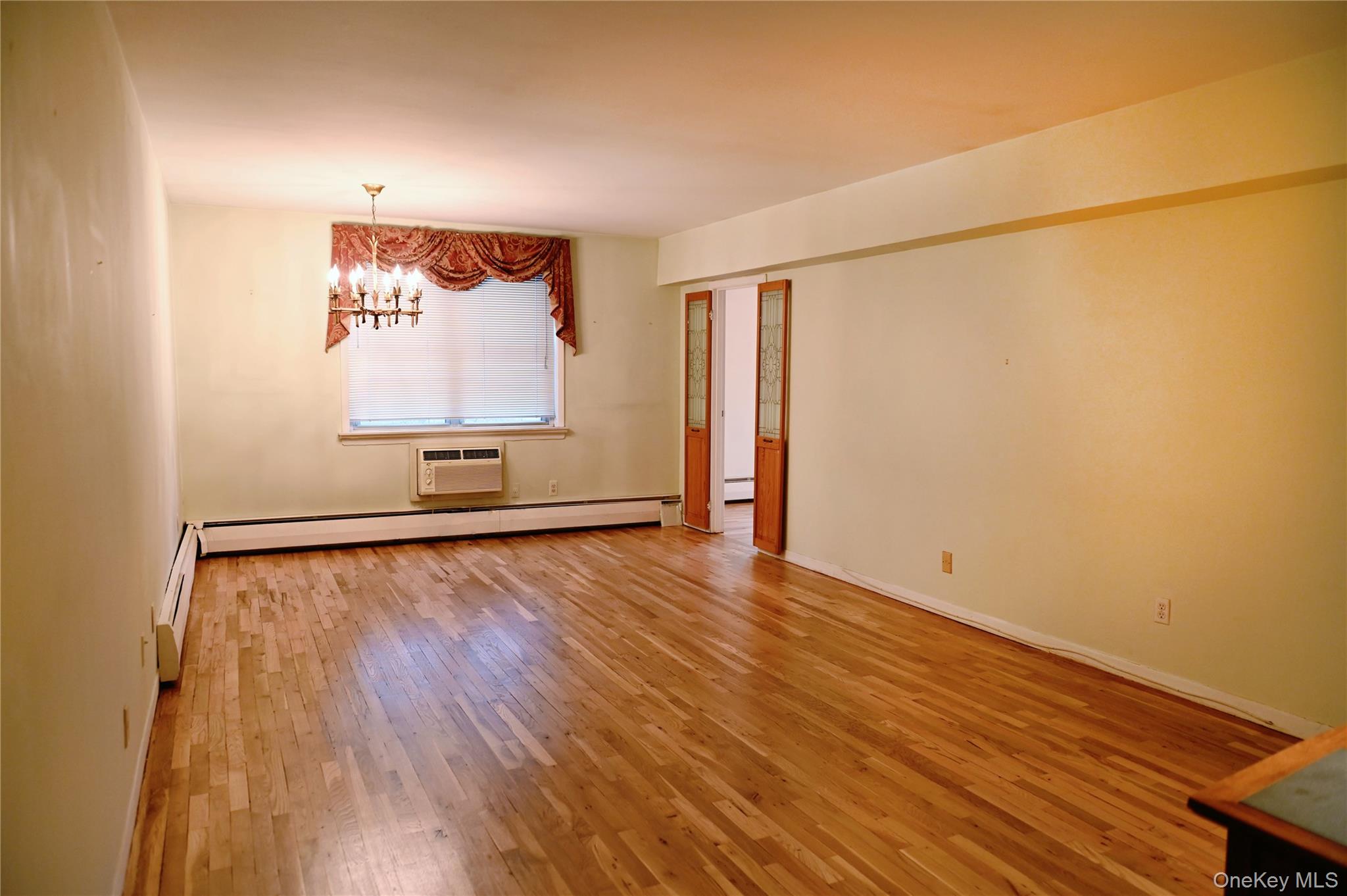 2 Fowler Avenue, Unit 228 Lynbrook, NY 11563 - Photo 5 of 21 Living Room Newly Refinished Hardwood Floors