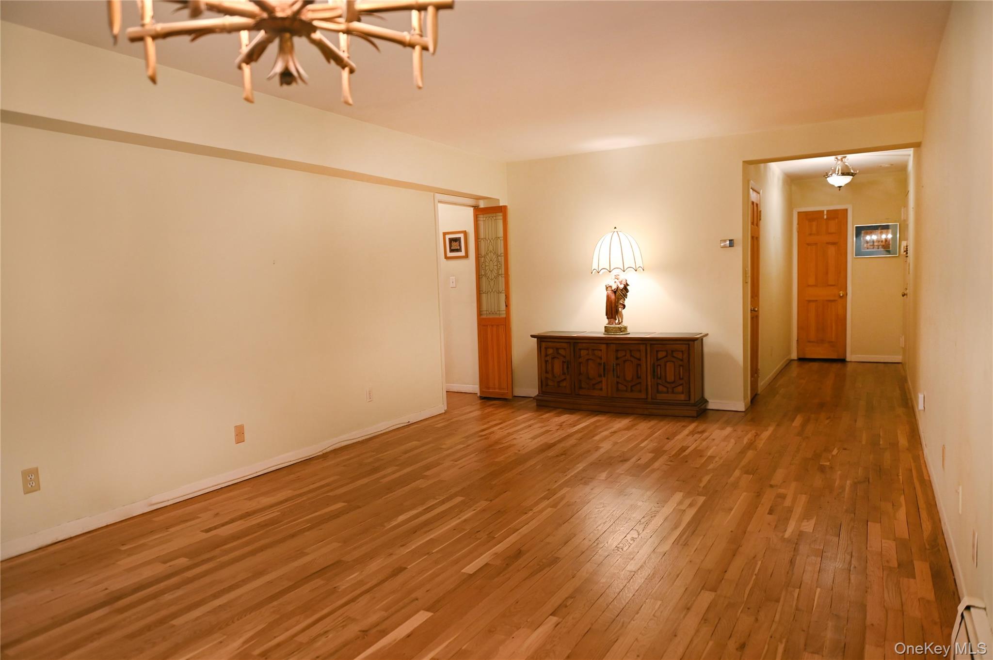 2 Fowler Avenue, Unit 228 Lynbrook, NY 11563 - Photo 6 of 21 Living Room Newly Refinished Floors