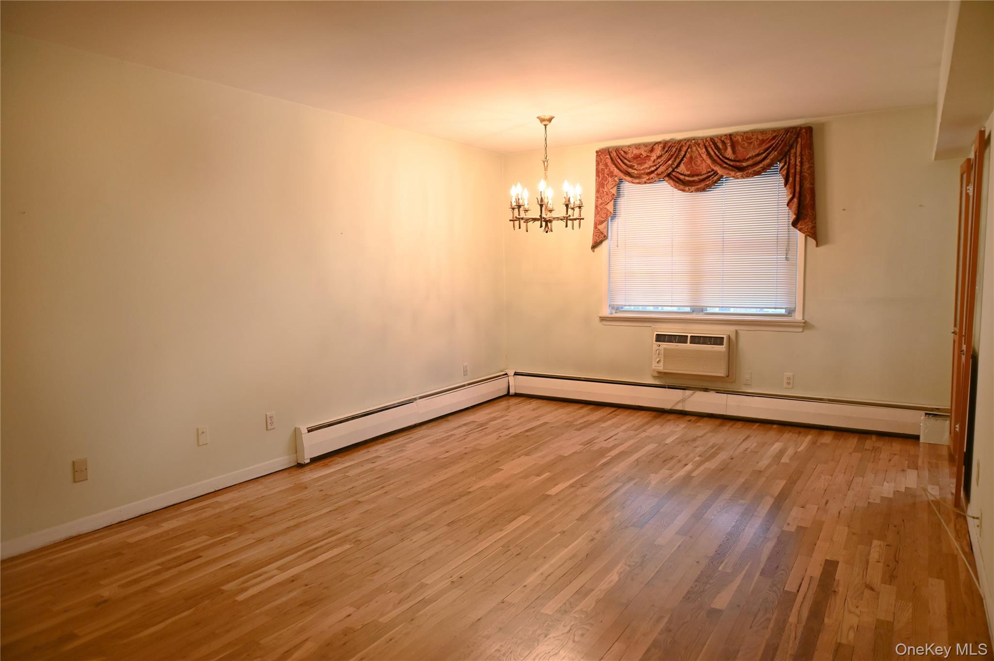2 Fowler Avenue, Unit 228 Lynbrook, NY 11563 - Photo 8 of 21 Dining Area Newly Refinished Floors