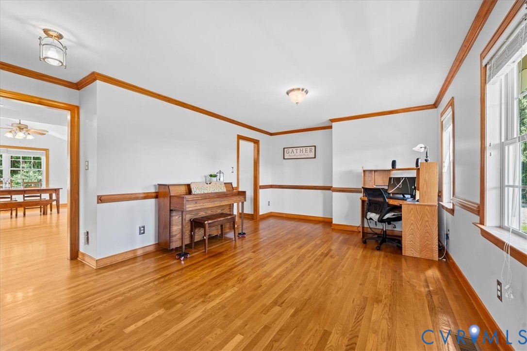3137 Trenholm Road Powhatan, VA 23139 - Photo 23 of 72 a living room with furniture and a wooden floor