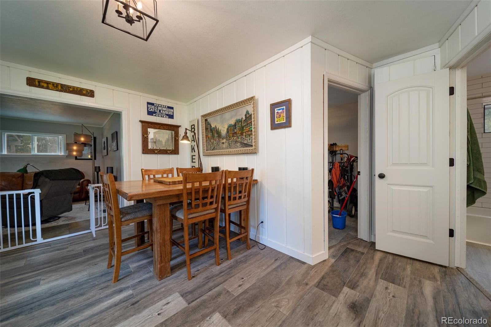 1749 North 15th Street Grand Junction, CO 81501 - Photo 16 of 23 a view of a dining room with furniture and wooden floor