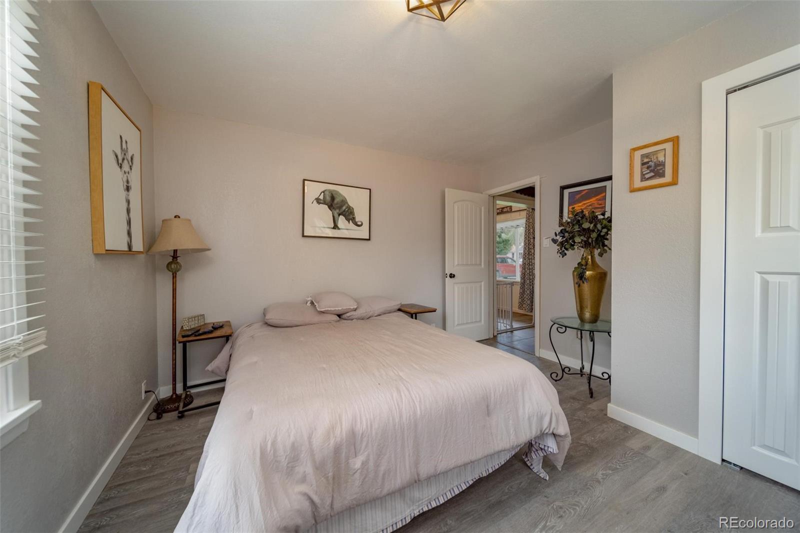 1749 North 15th Street Grand Junction, CO 81501 - Photo 22 of 23 a bedroom with a bed and a table
