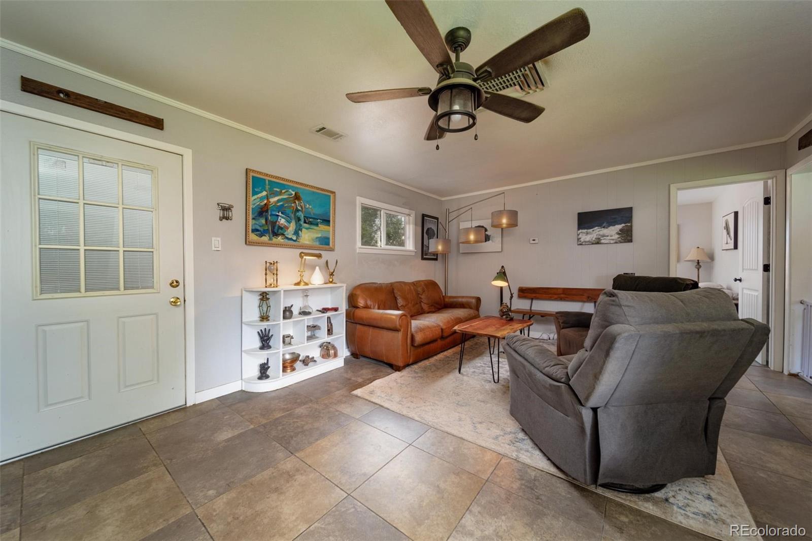 1749 North 15th Street Grand Junction, CO 81501 - Photo 8 of 23 a living room with furniture and a window
