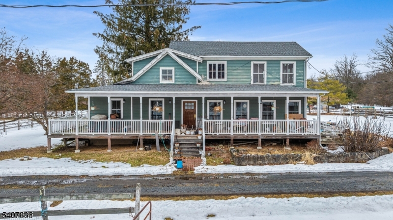 63 Linvale Road Ringoes, NJ 08551 - Photo 2 of 49 a front view of a house with a yard