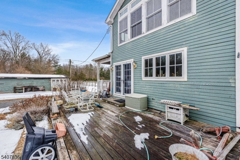 63 Linvale Road Ringoes, NJ 08551 - Photo 34 of 49 a view of a patio with chairs and potted plants