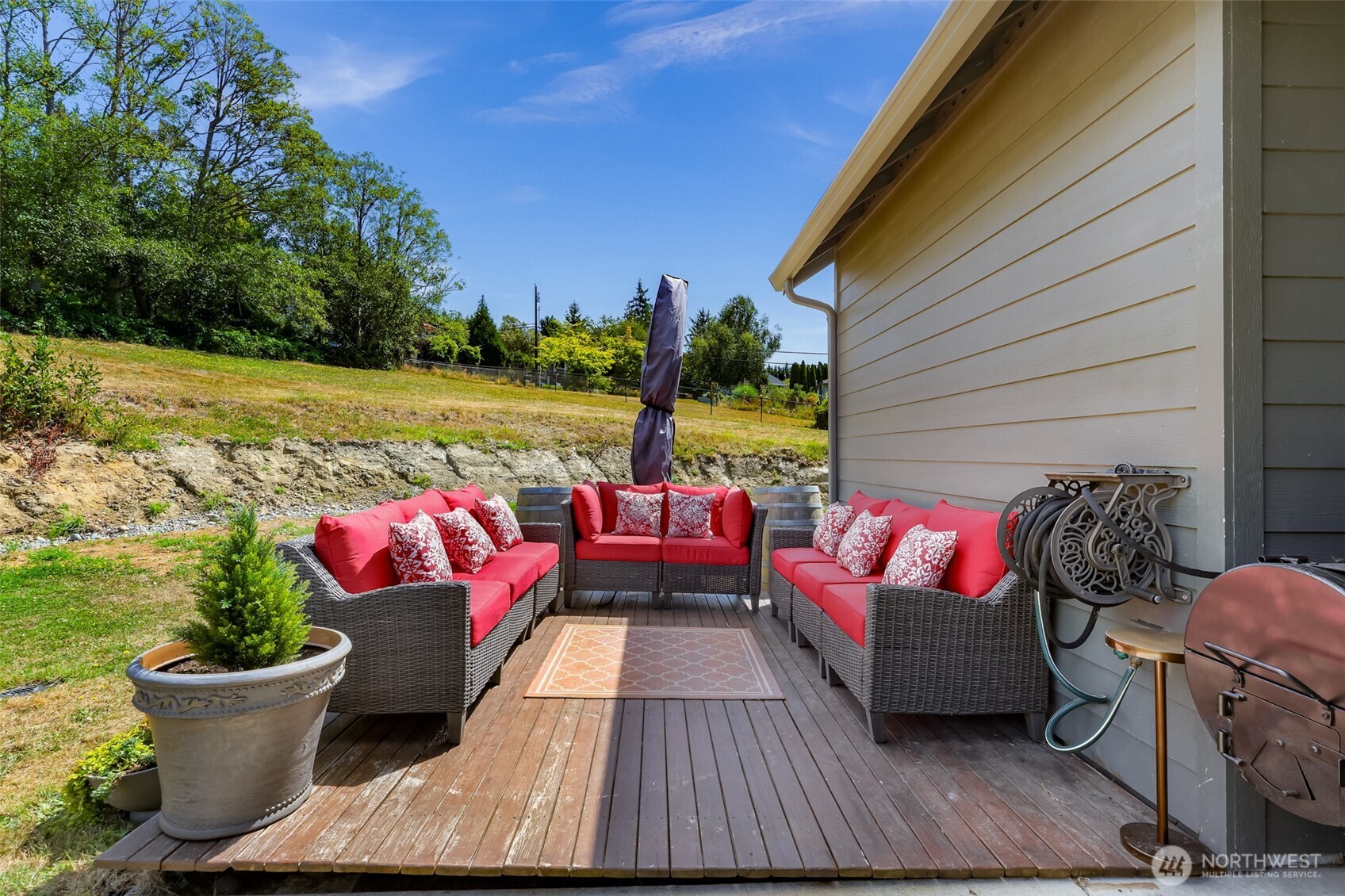 19727 Skyridge Road Mount Vernon, WA 98274 - Photo 11 of 32 a balcony with furniture and potted plants
