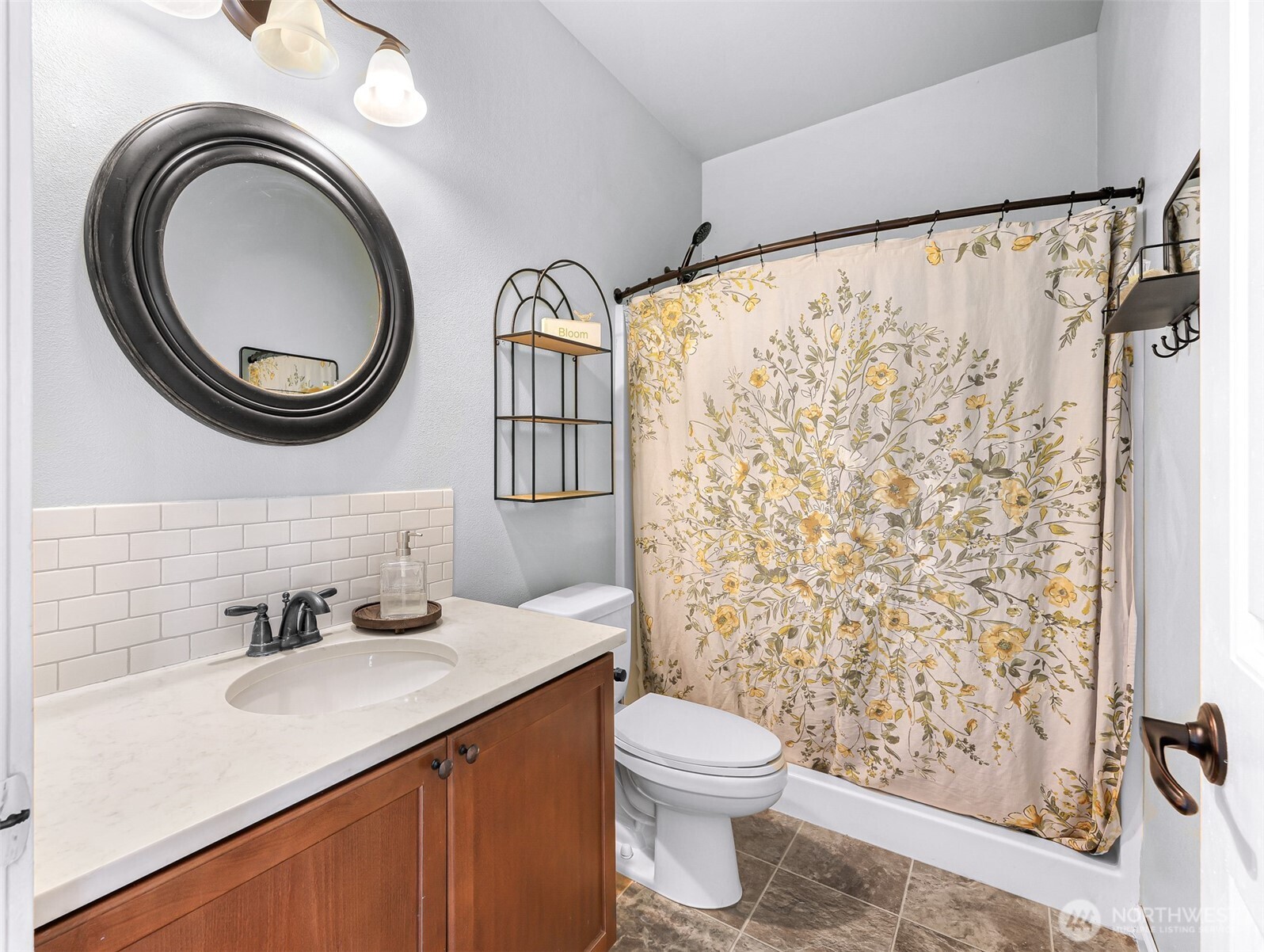19727 Skyridge Road Mount Vernon, WA 98274 - Photo 12 of 32 a bathroom with a sink a toilet and a shower