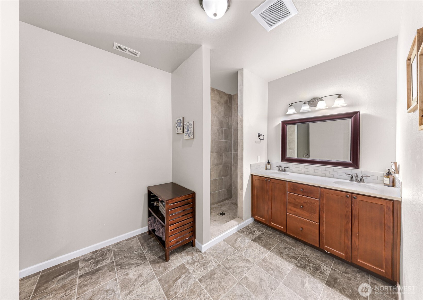 19727 Skyridge Road Mount Vernon, WA 98274 - Photo 15 of 32 a room with a mirror and a sink