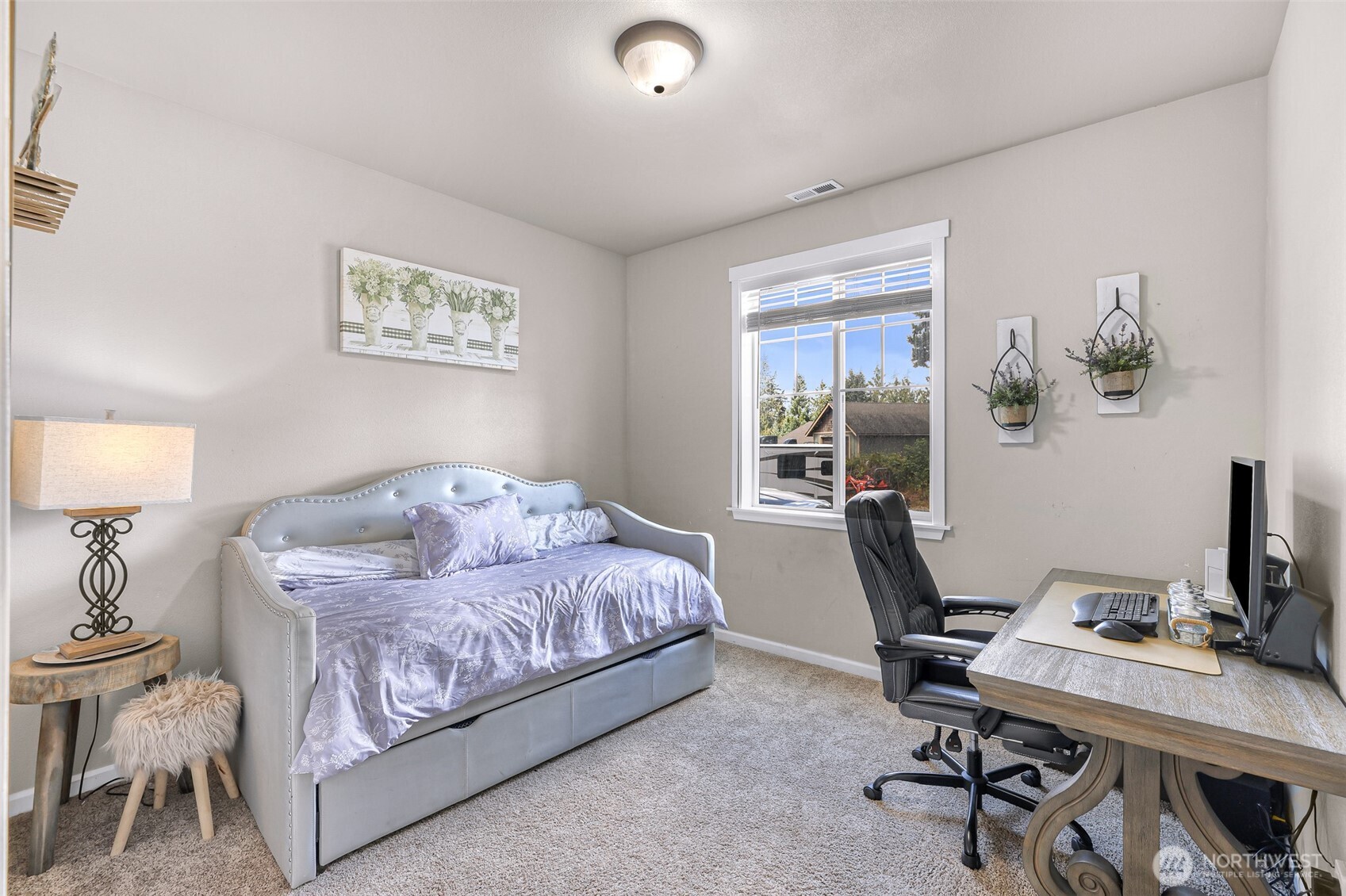 19727 Skyridge Road Mount Vernon, WA 98274 - Photo 18 of 32 a bedroom with a bed and a desk