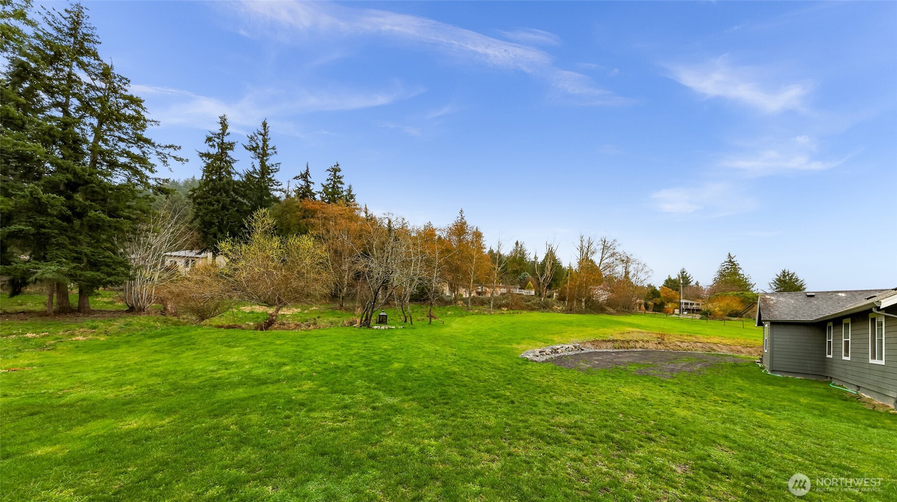 19727 Skyridge Road Mount Vernon, WA 98274 - Photo 27 of 32 a view of a golf course with a garden