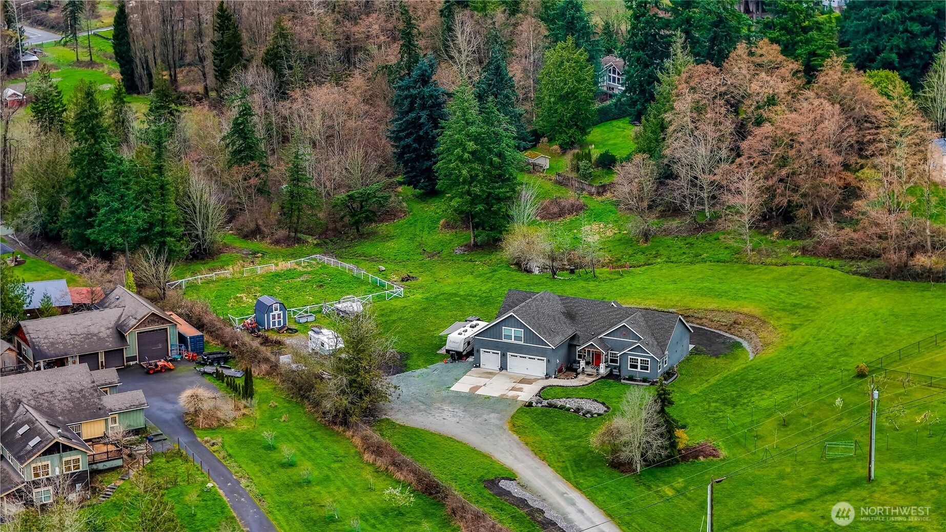 19727 Skyridge Road Mount Vernon, WA 98274 - Photo 29 of 32 an aerial view of a house with a garden