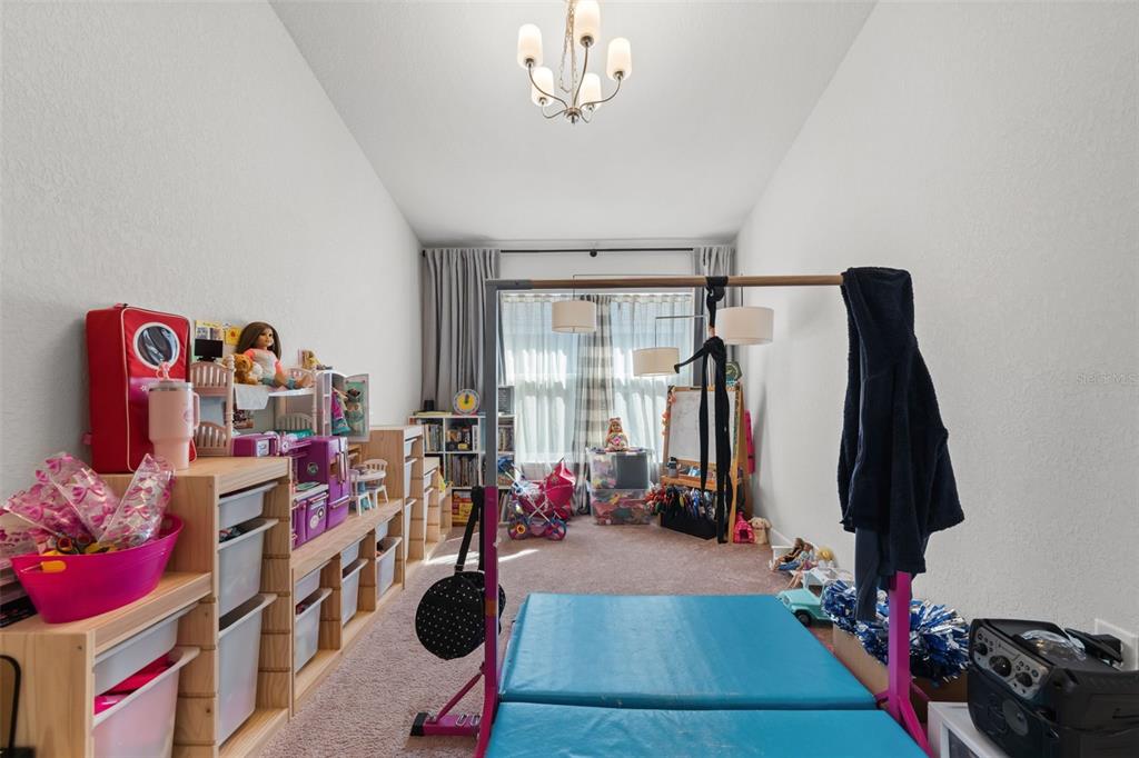 199 Bittern Loop Inverness, FL 34453 - Photo 22 of 36 a view of a room with gym equipment