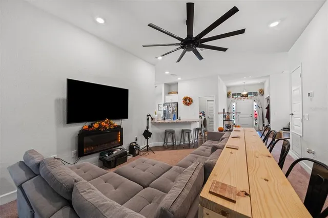 a kitchen with a table and chairs in it