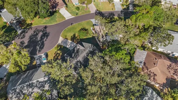 an aerial view of a house with a garden