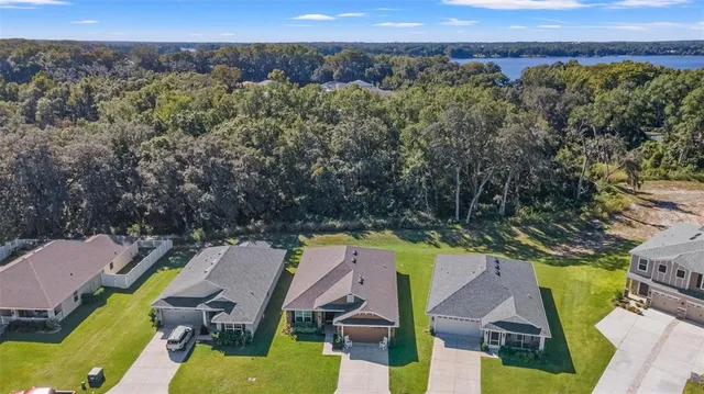 an aerial view of a house with a garden