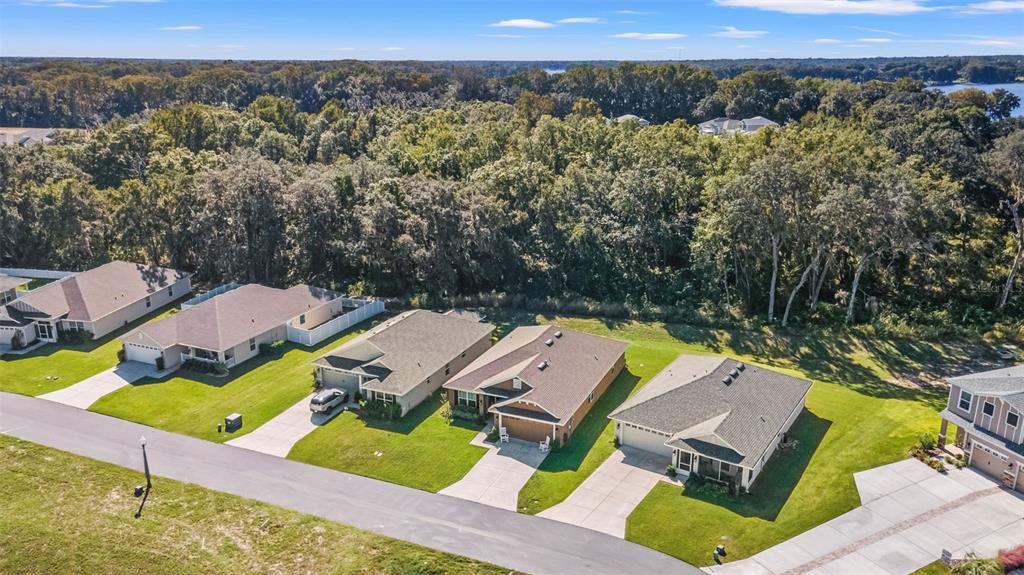 199 Bittern Loop Inverness, FL 34453 - Photo 35 of 36 an aerial view of residential houses with outdoor space