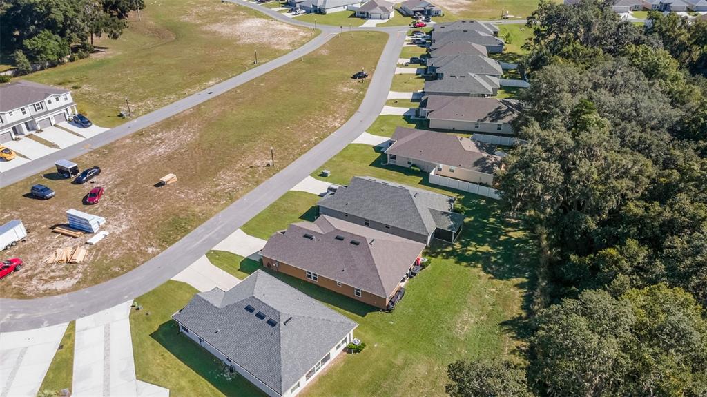 199 Bittern Loop Inverness, FL 34453 - Photo 36 of 36 an aerial view of a house with a garden