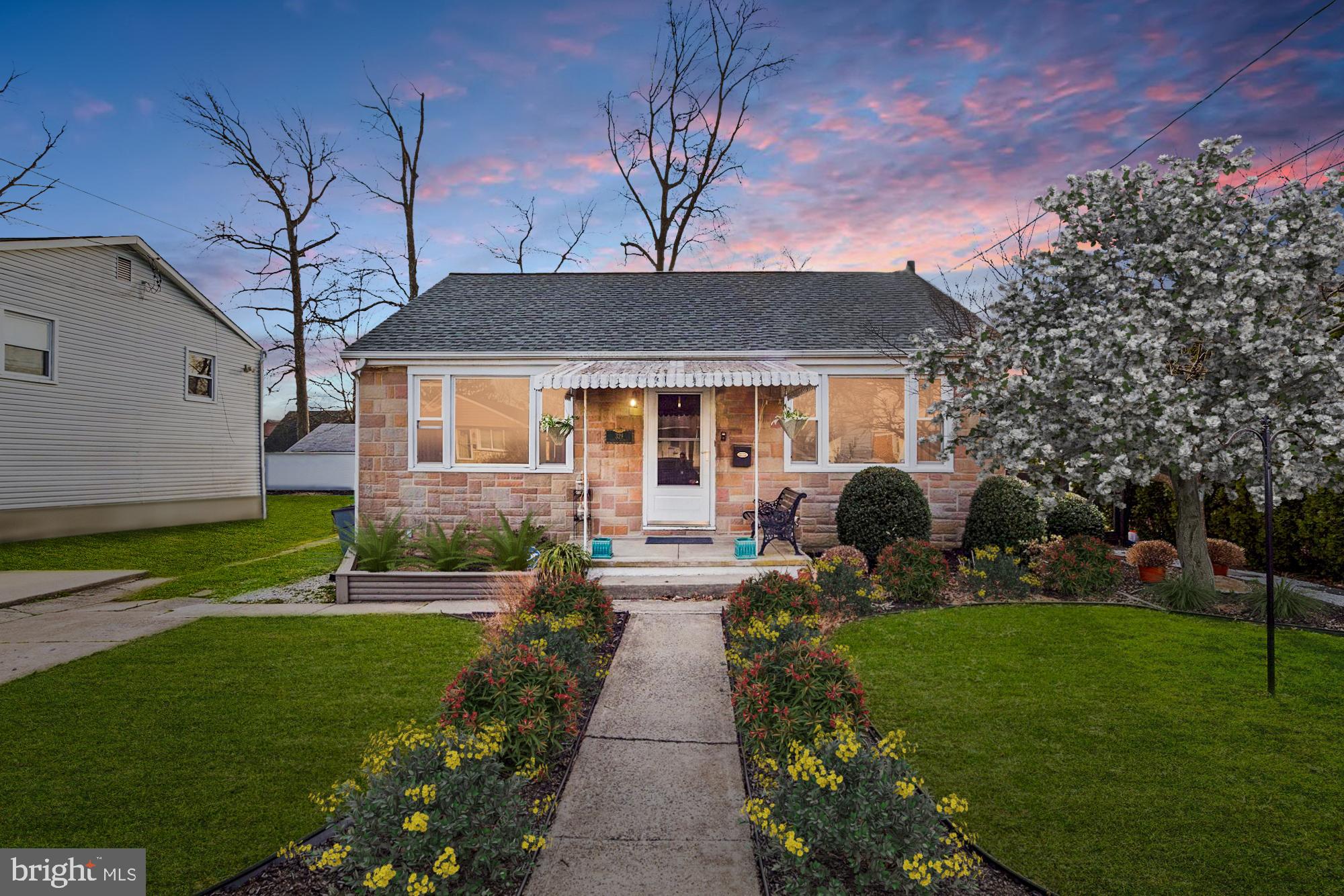 329 Ridley Avenue Folsom, PA 19033 - Photo 1 of 42 Front Exterior (virtually staged, in bloom)